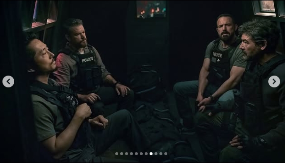 Ben Affleck and Matt Damon sat alongside fellow officers during an operation in "The Rip." | Source: Instagram/netflixpt