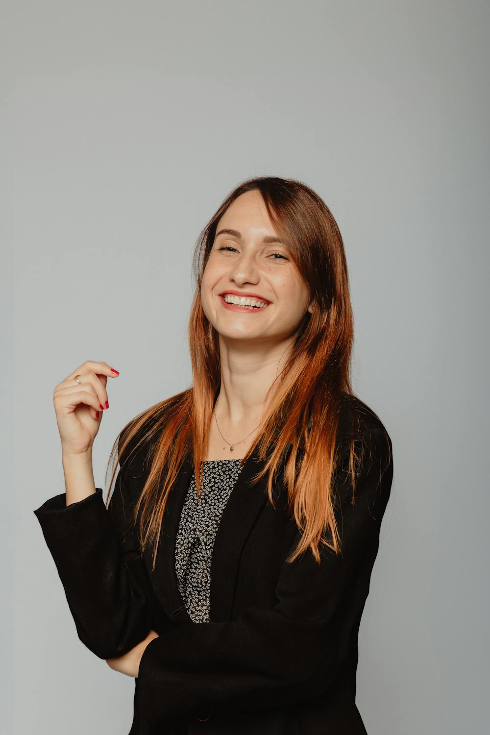A smiling young woman | Source: Pexels