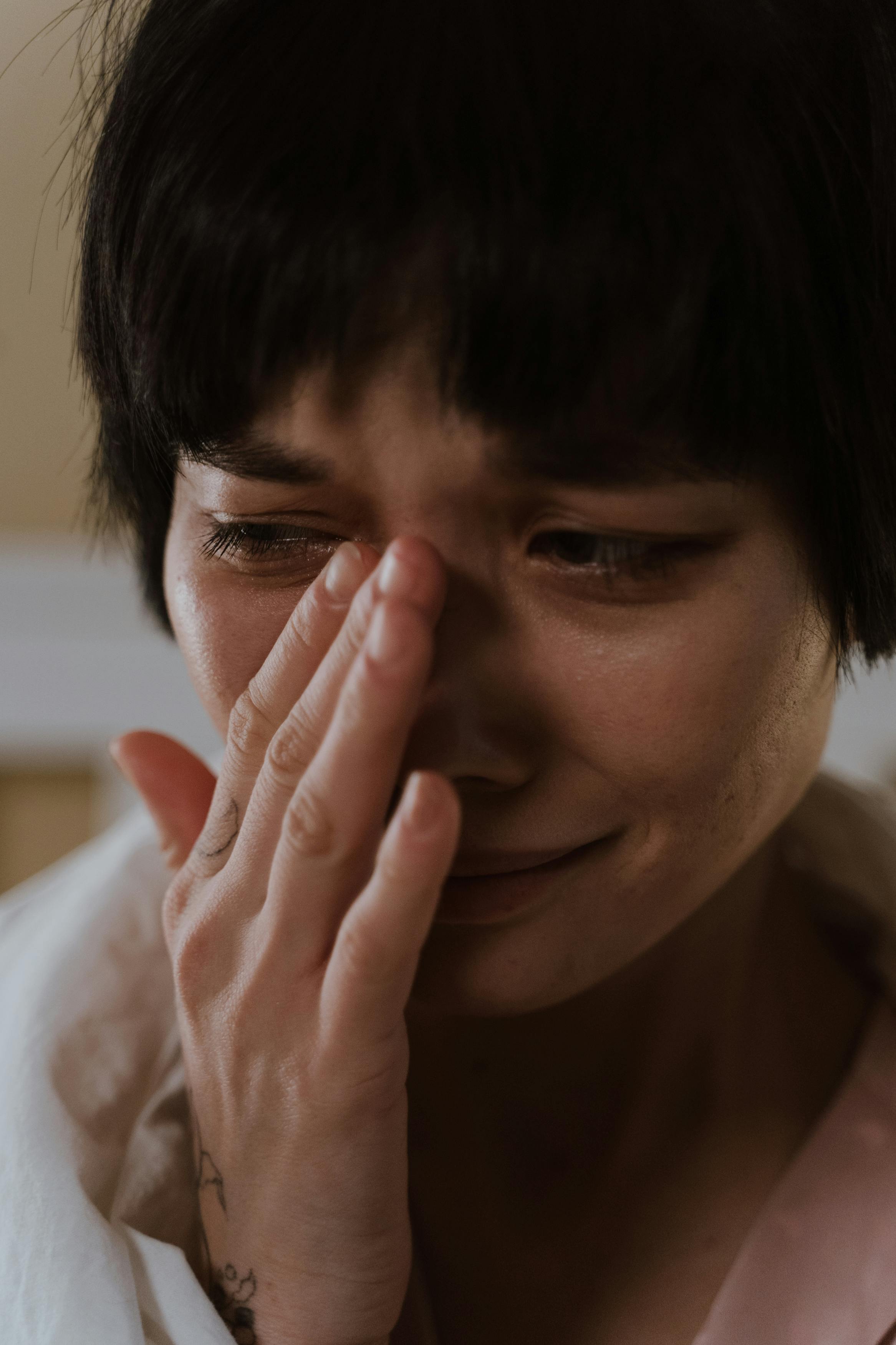 Emotional female face tears