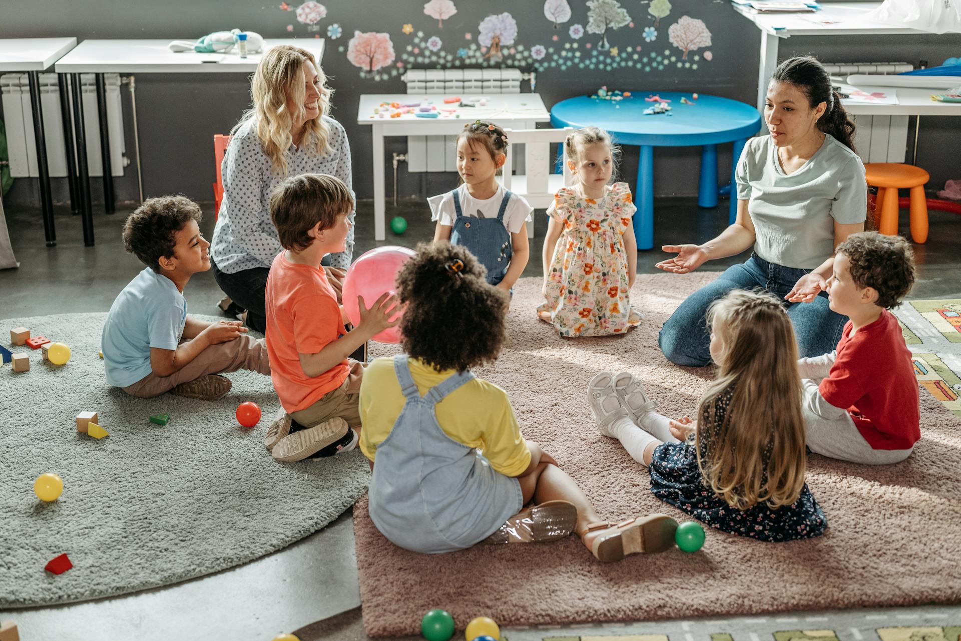 Little children with their teacher | Source: Pexels