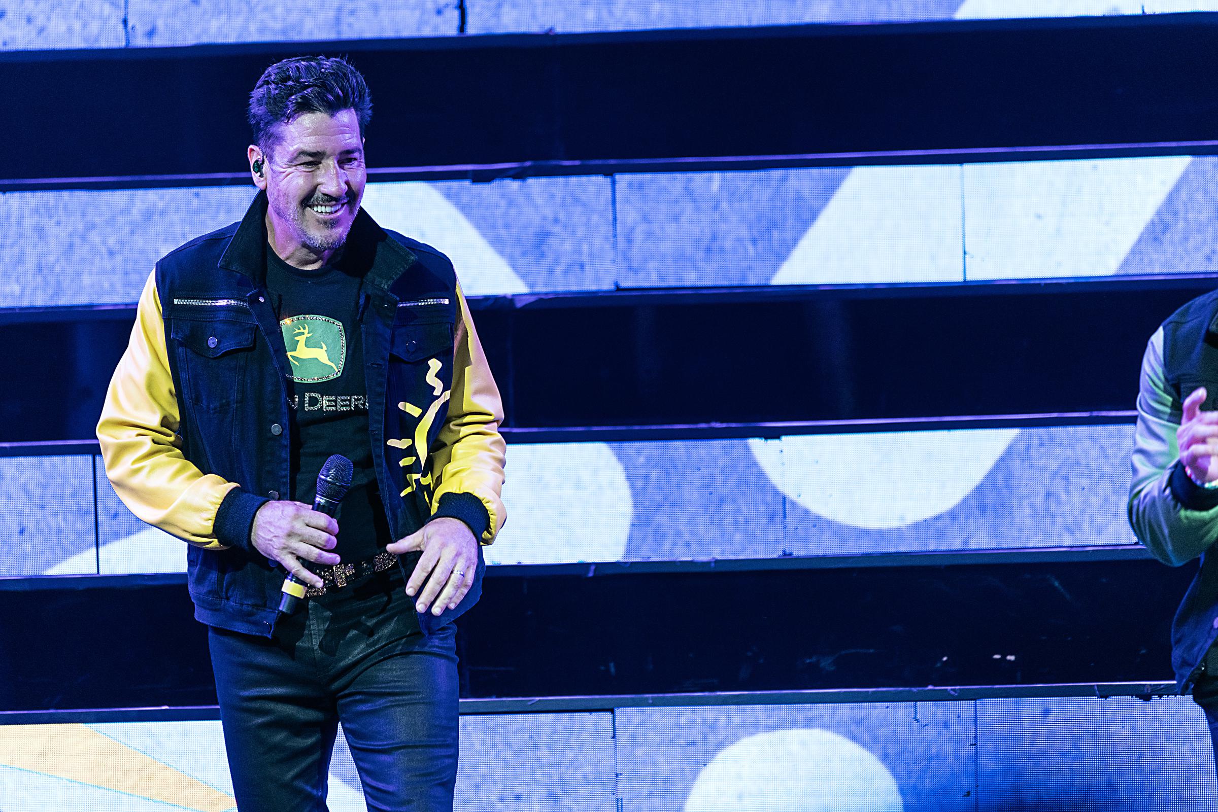 Jonathan Knight performing onstage at the PNC Music Pavilion in Charlotte, North Carolina on July 27, 2024. | Source: Getty Images