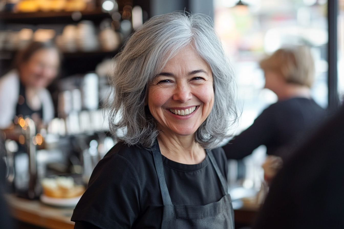 A mature woman working as a waitress | Source: no source