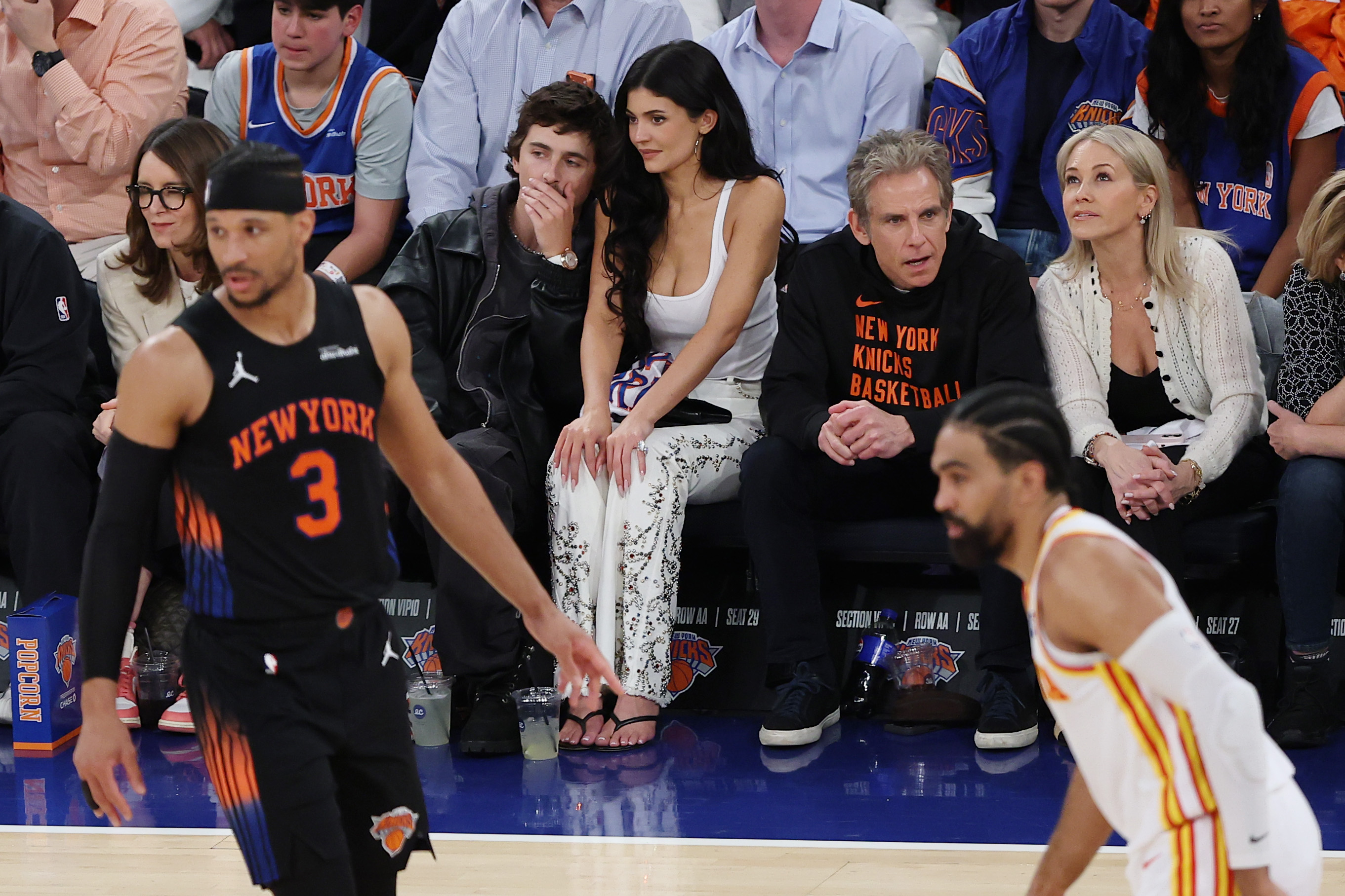 Tina Fey, Timothée Chalamet, Kylie Jenner, Ben Stiller, and Christine Taylor attend Game Five of the Eastern Conference First Round NBA Playoffs between the New York Knicks and the Atlanta Hawks at Madison Square Garden on April 28, 2026 in New York City. | Source: Getty Images