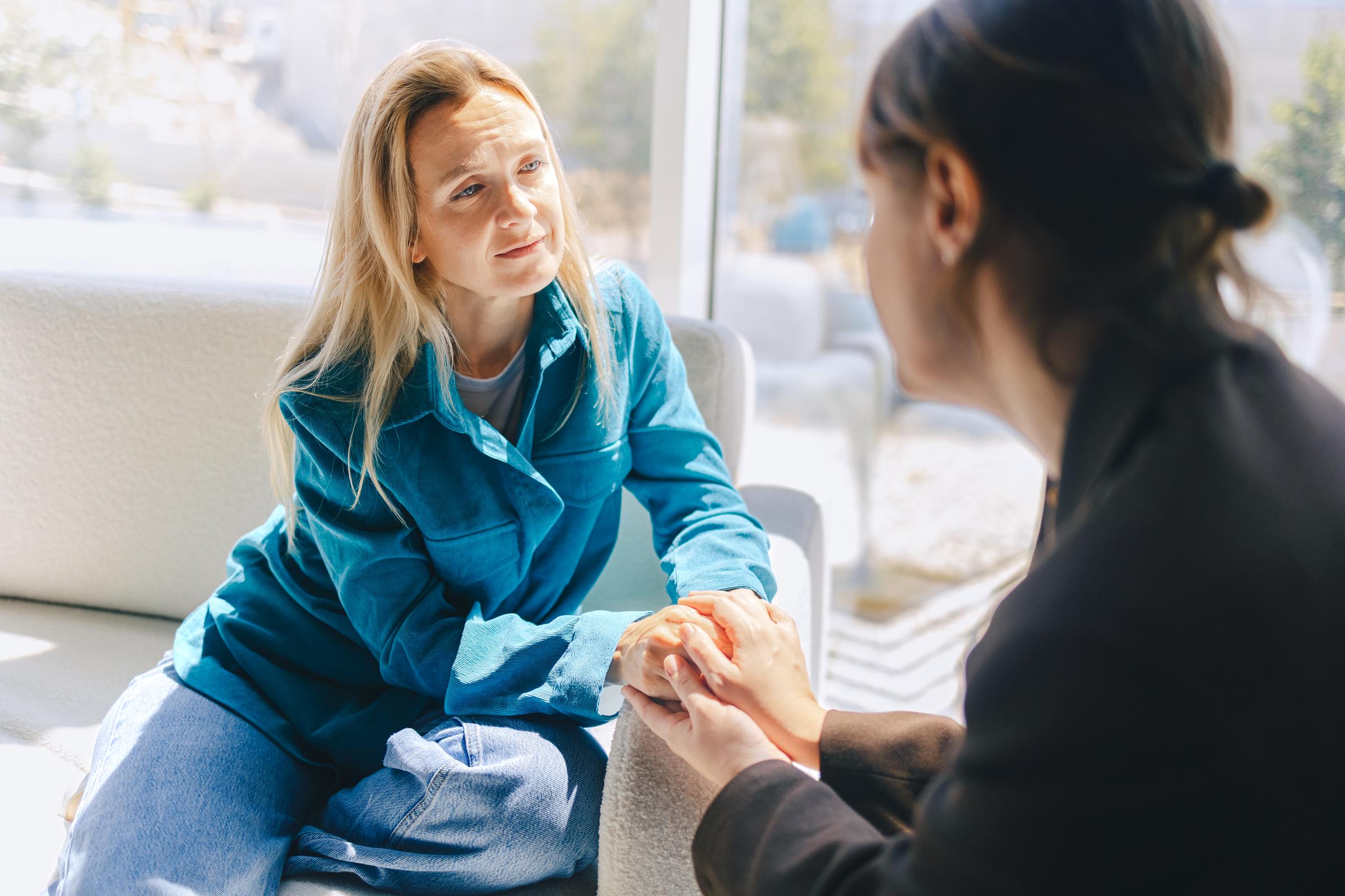 A woman comforting another woman | Source: Getty Images