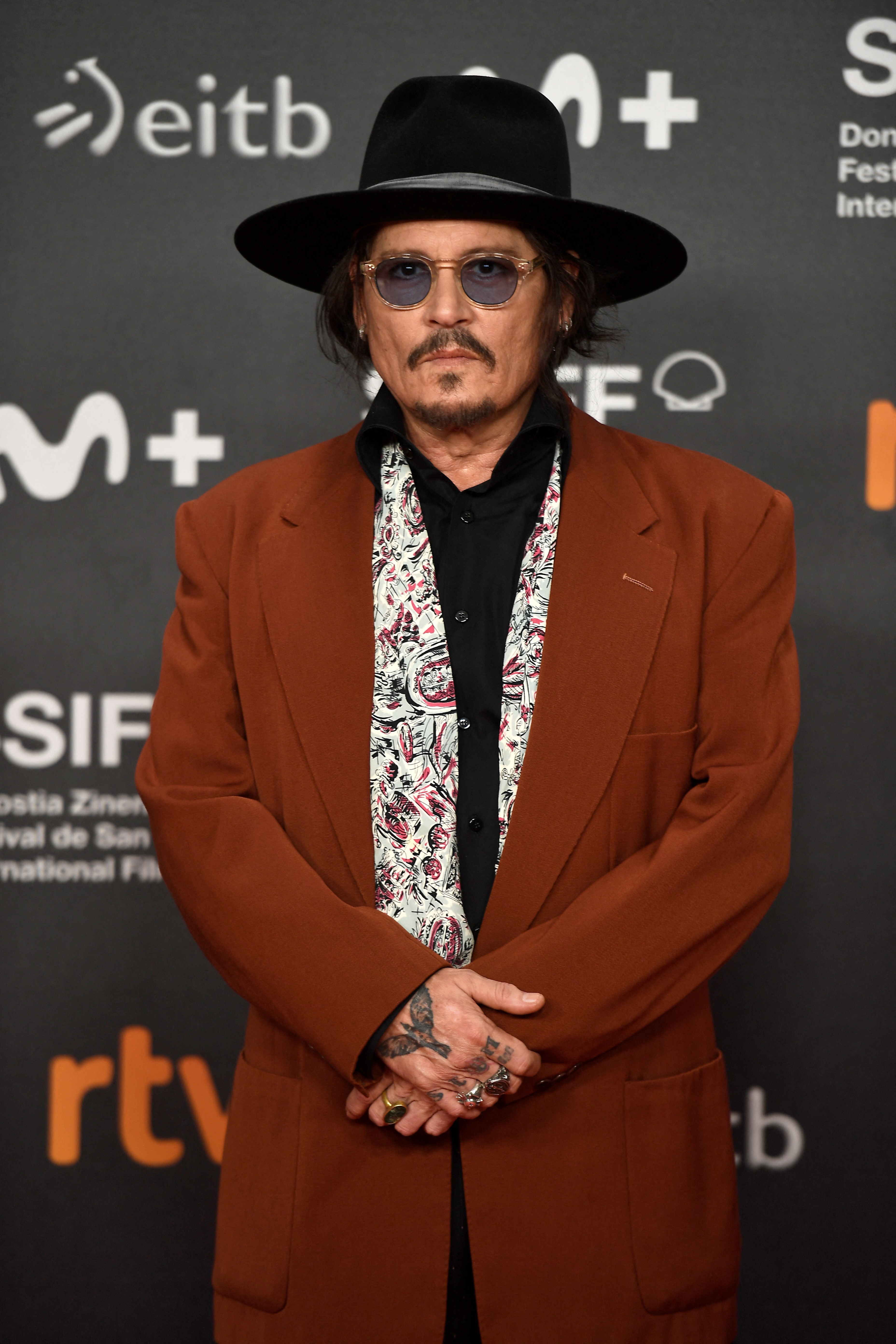Johnny Deep poses on the red carpet to promote the film "Modi, Three Days on the Wing of Madness" during the 72nd San Sebastian International Film Festival on September 24, 2024, in the northern Spanish Basque city of San Sebastian. | Source: Getty Images