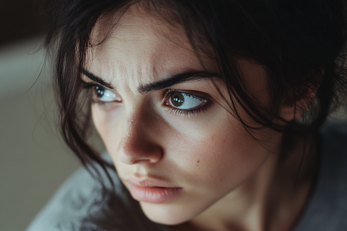 A scowling woman | Source: No source