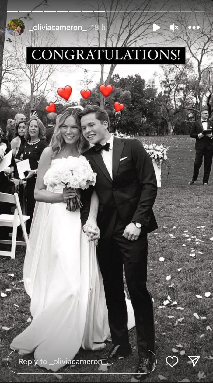 Lev and Elliott Bure during their wedding, dated January 2024 | Source: Instagram/_oliviacameron_