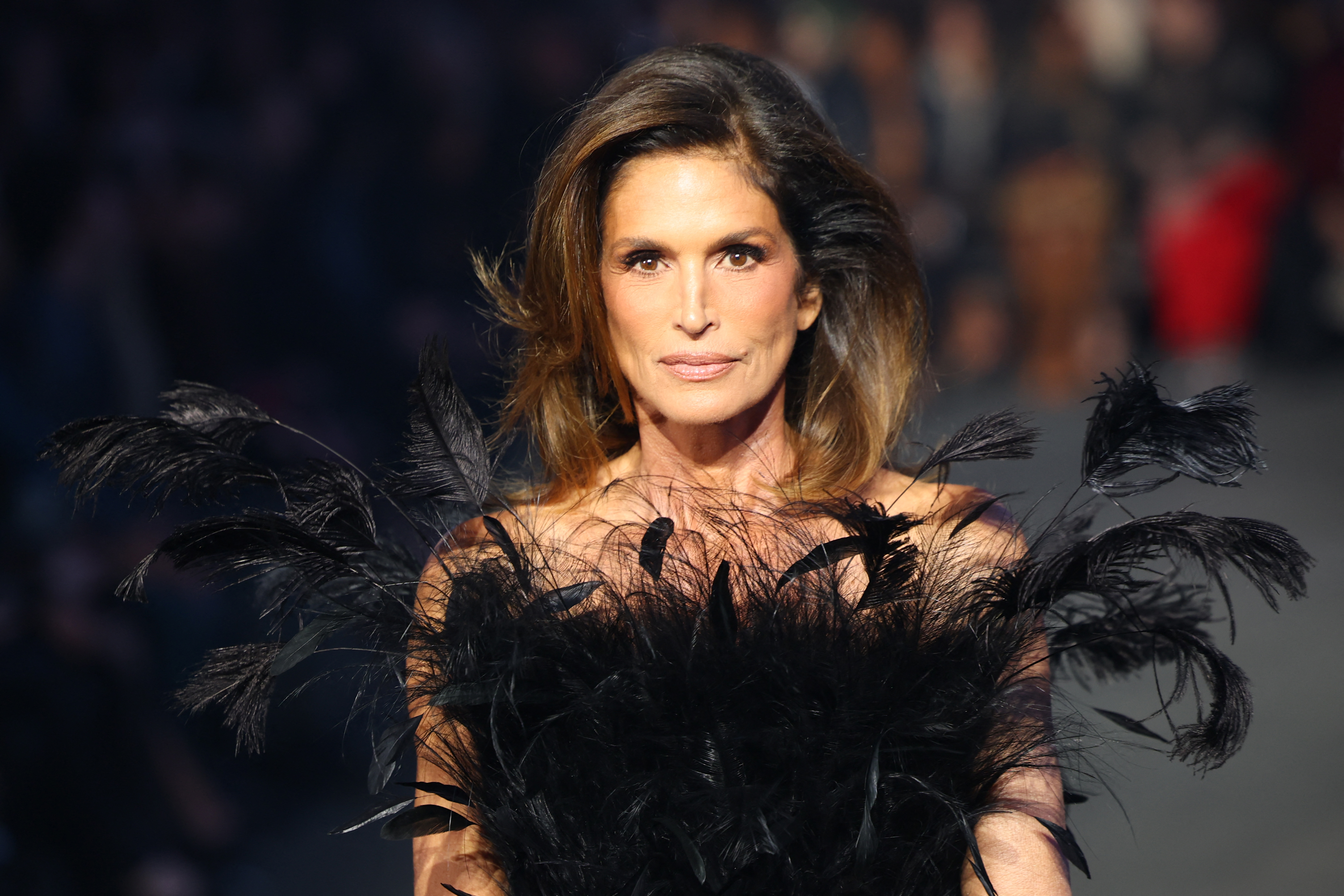 Cindy Crawford walks the runway during the Gucci Cruise 2027 collection fashion show at Times Square on May 16, 2026 in New York City. | Source: Getty Images