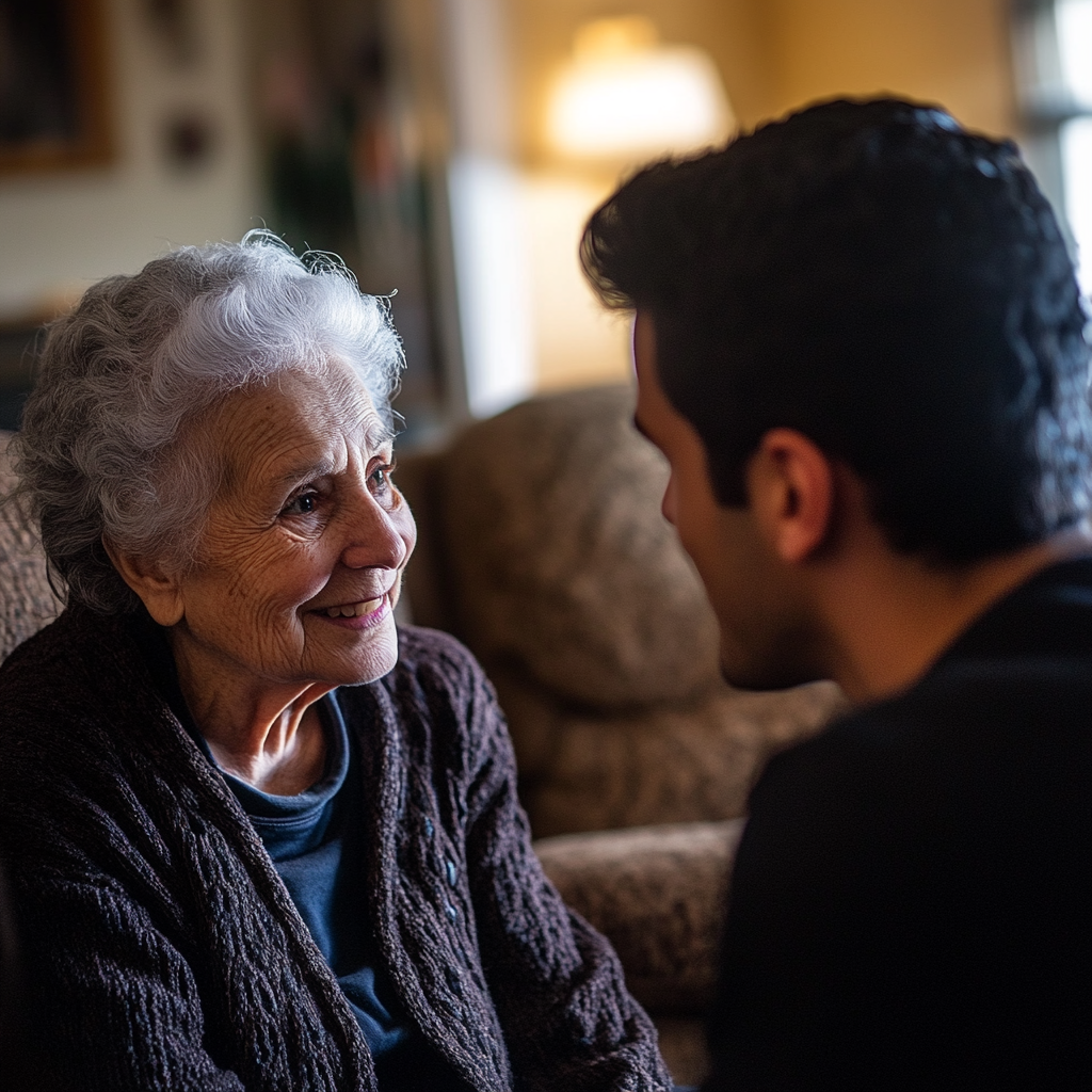 An elderly woman talking to her son | Source: No source