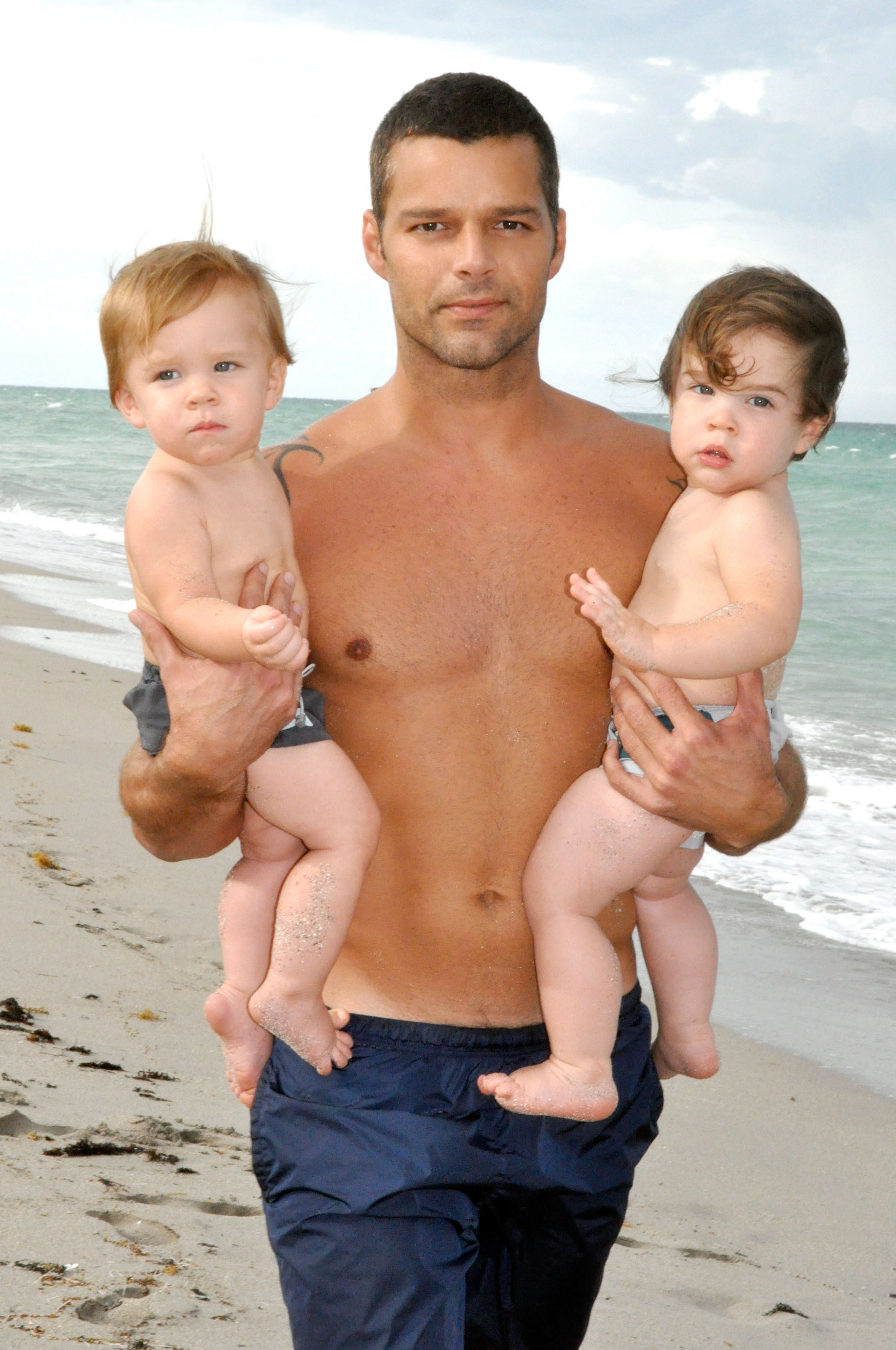 Ricky Martin poses with his sons Valentino and Matteo on August 18, 2009 in Miami, Florida. | Source: Getty Images