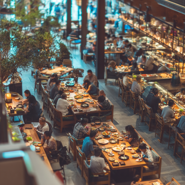 People enjoying their meals at a restaurant | Source: No source