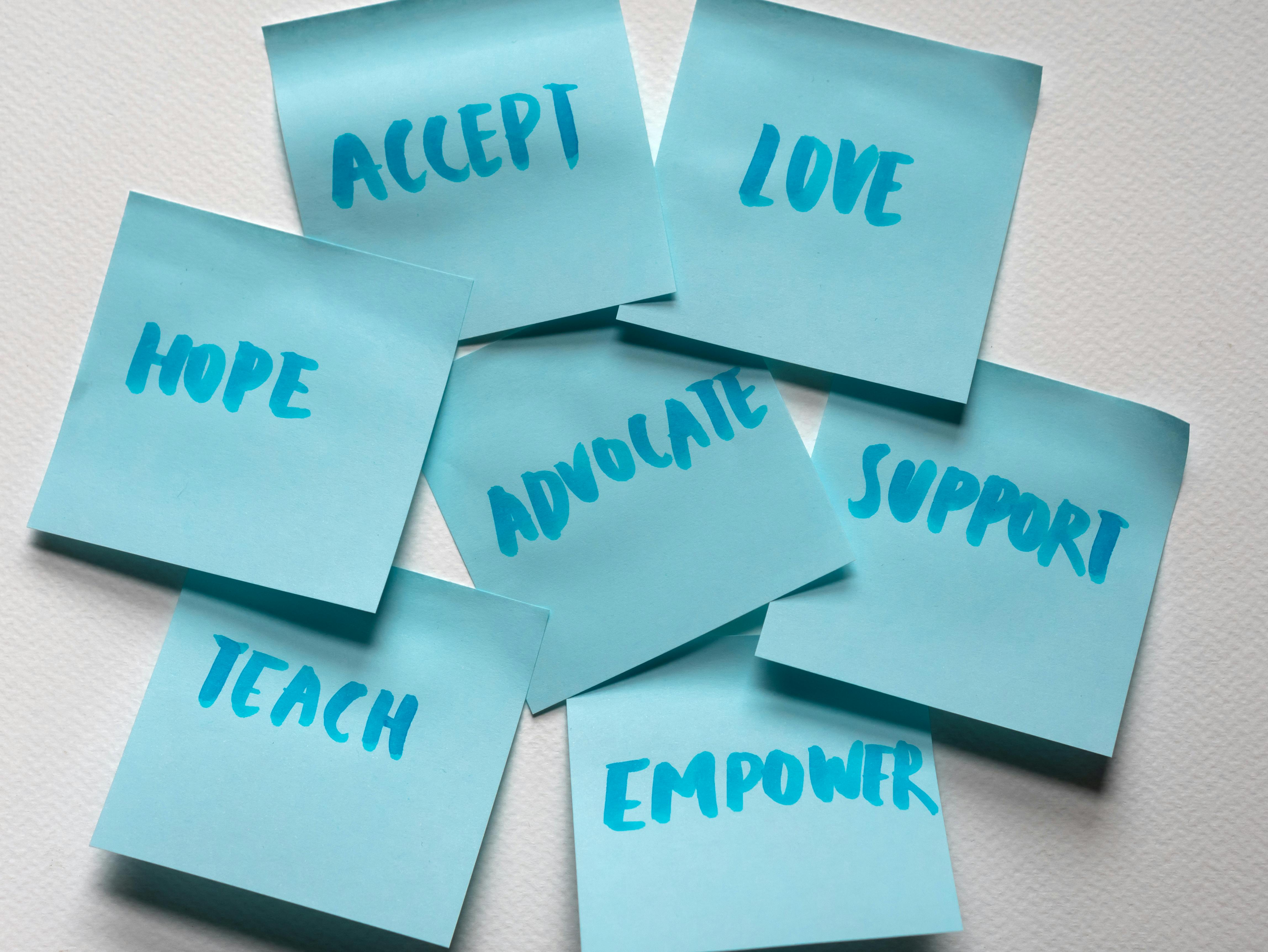 Positive words on blue sticky notes | Source: Pexels