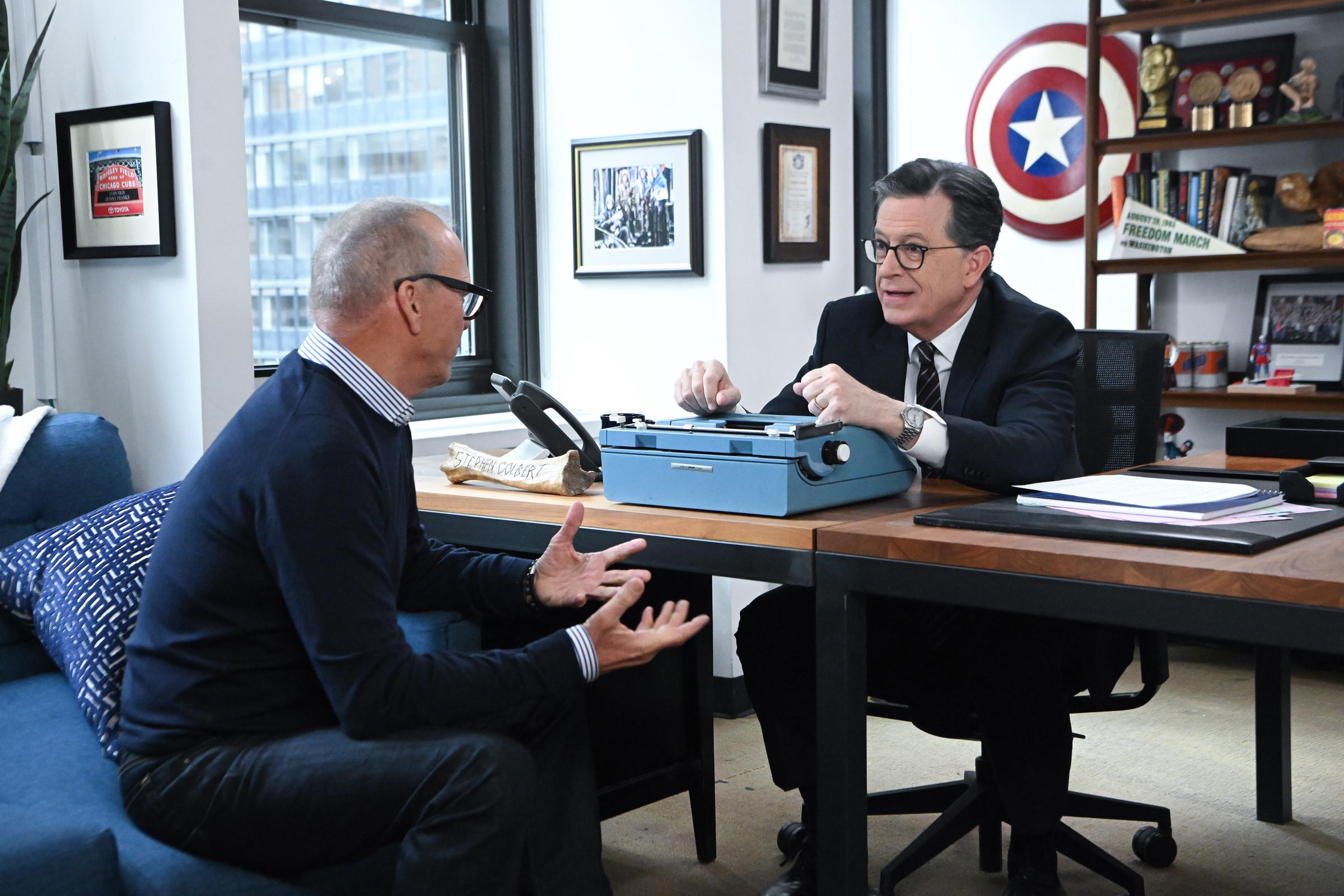 Michael Keaton and Stephen Colbert on the CBS series "The Late Show with Stephen Colbert" on May 18, 2026. | Source: Getty Images