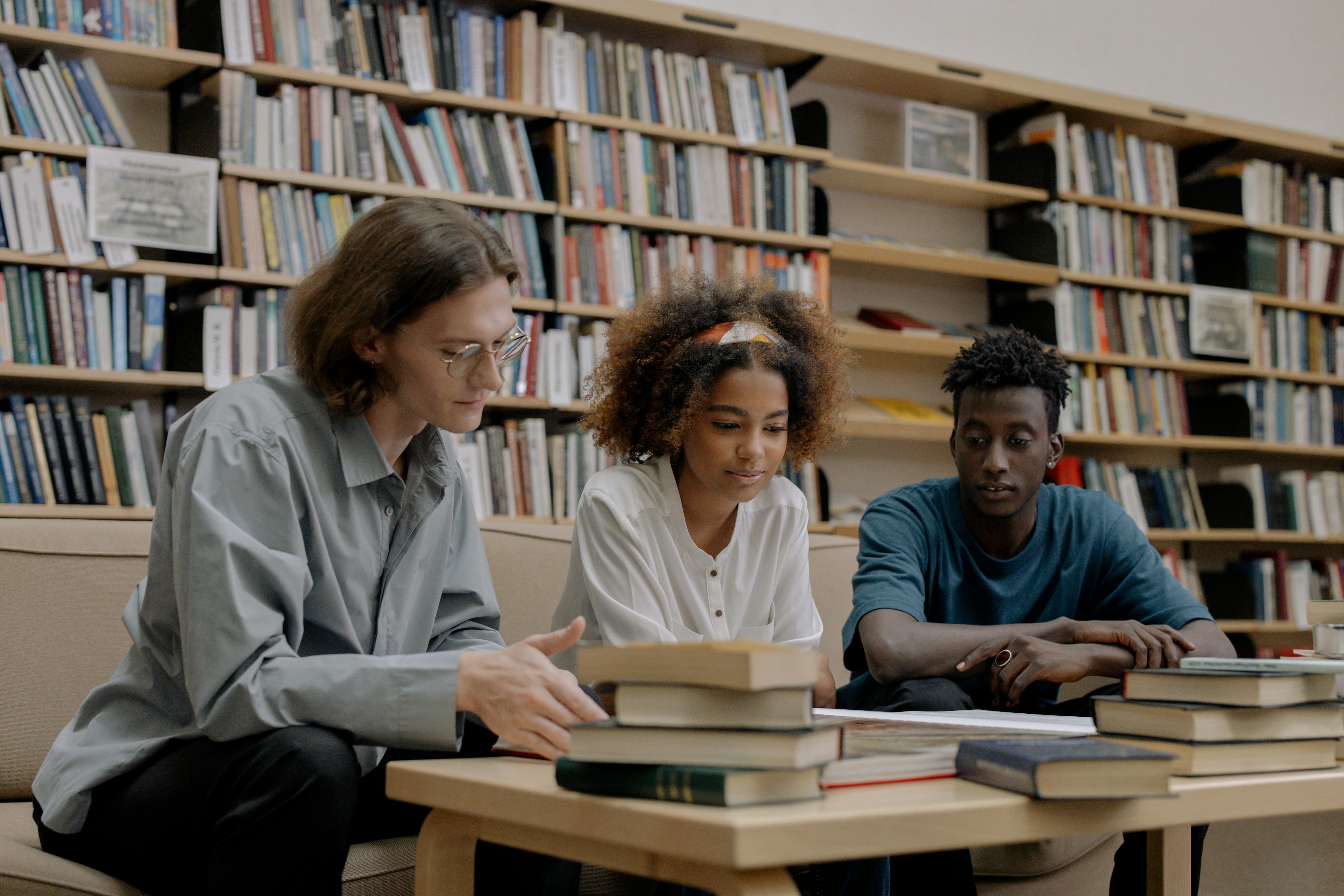 Students studying in a library | Source: Pexels