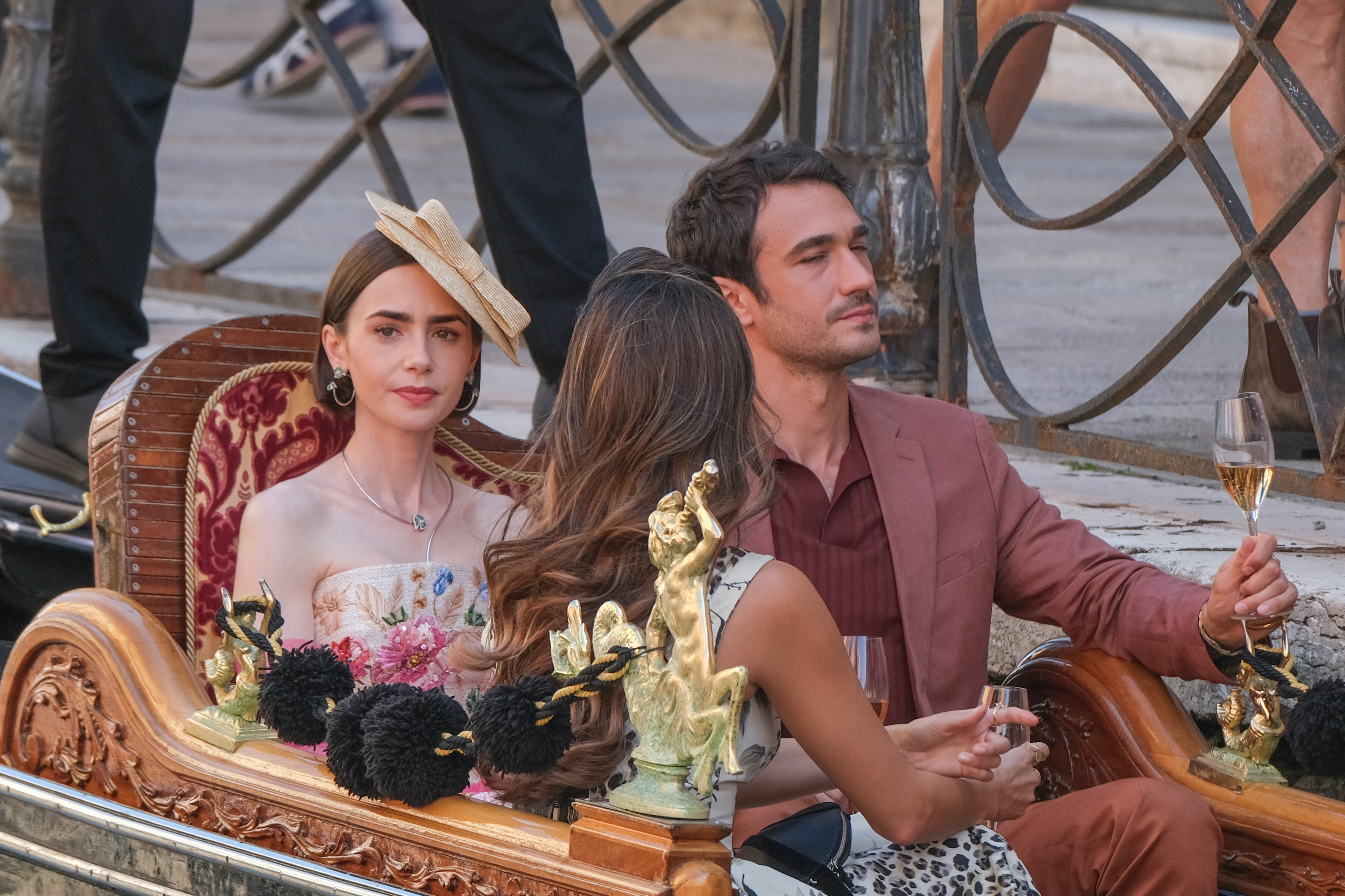 Lily Collins and Eugenio Franceschini are seen filming "Emily in Paris" on August 23, 2025, in Venice, Italy. | Source: Getty Images
