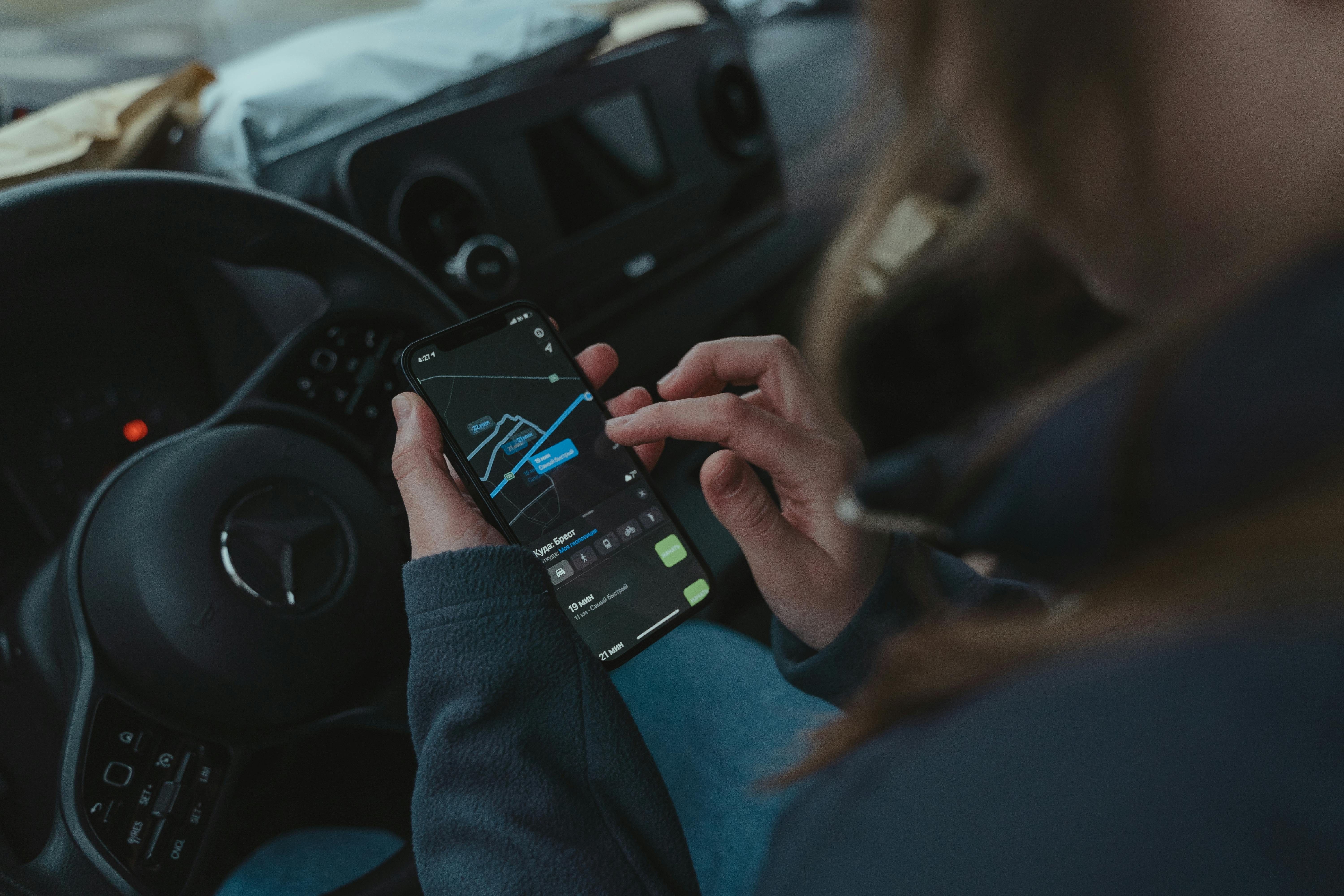 Person using GPS to navigate | Source: Pexels