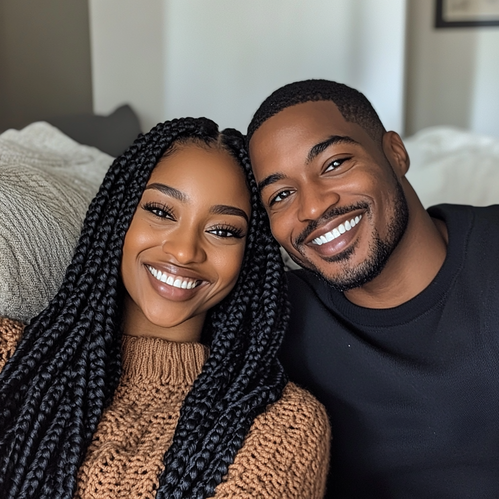 A smiling couple | Source: No source