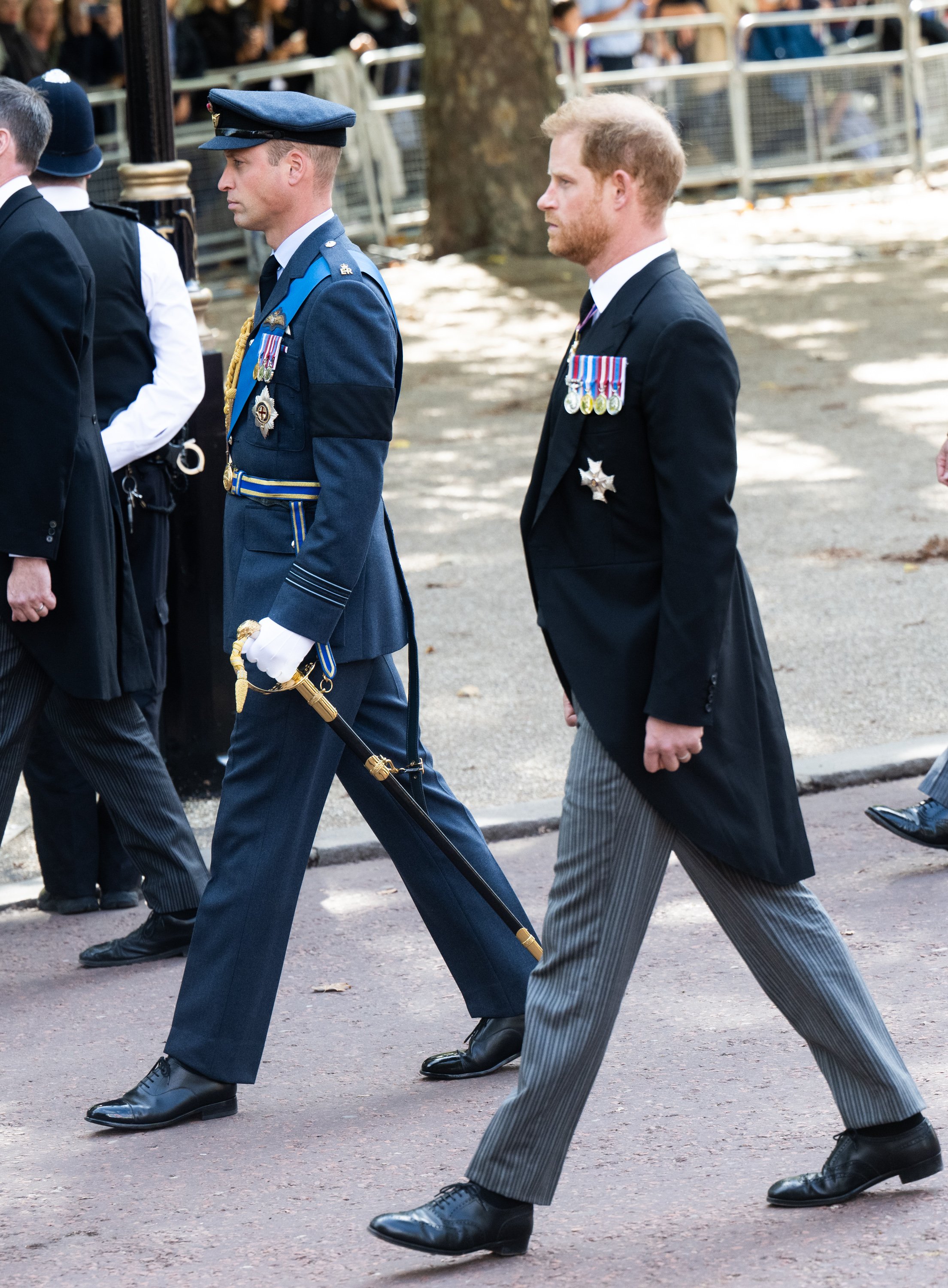Prince William and Prince Harry walk behind Queen Elizabeth II's coffin on September 14, 2022 | Source: Getty Images