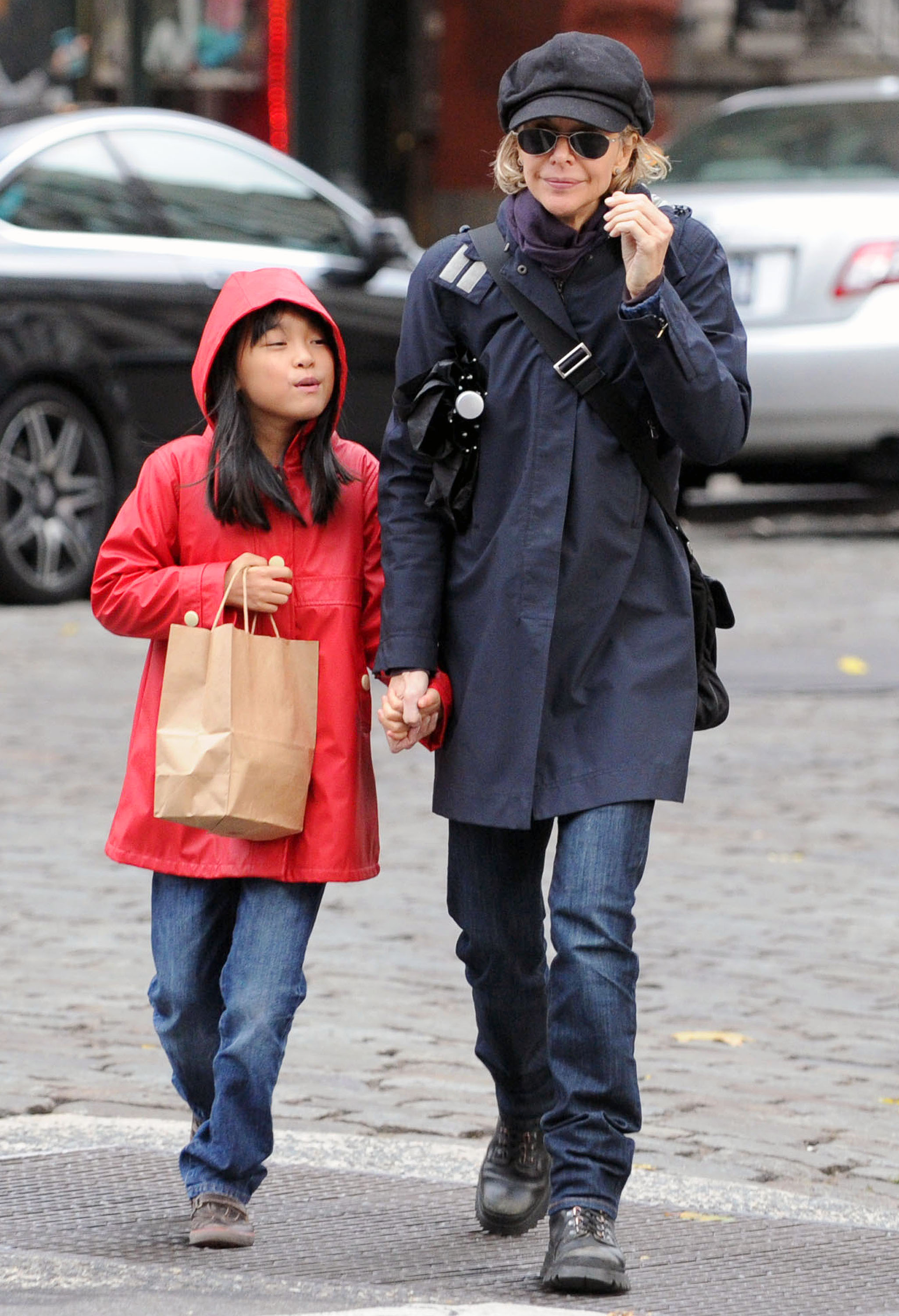 Meg and Daisy True Ryan, are seen on November 10, 2013 in New York City | Source: Getty Images