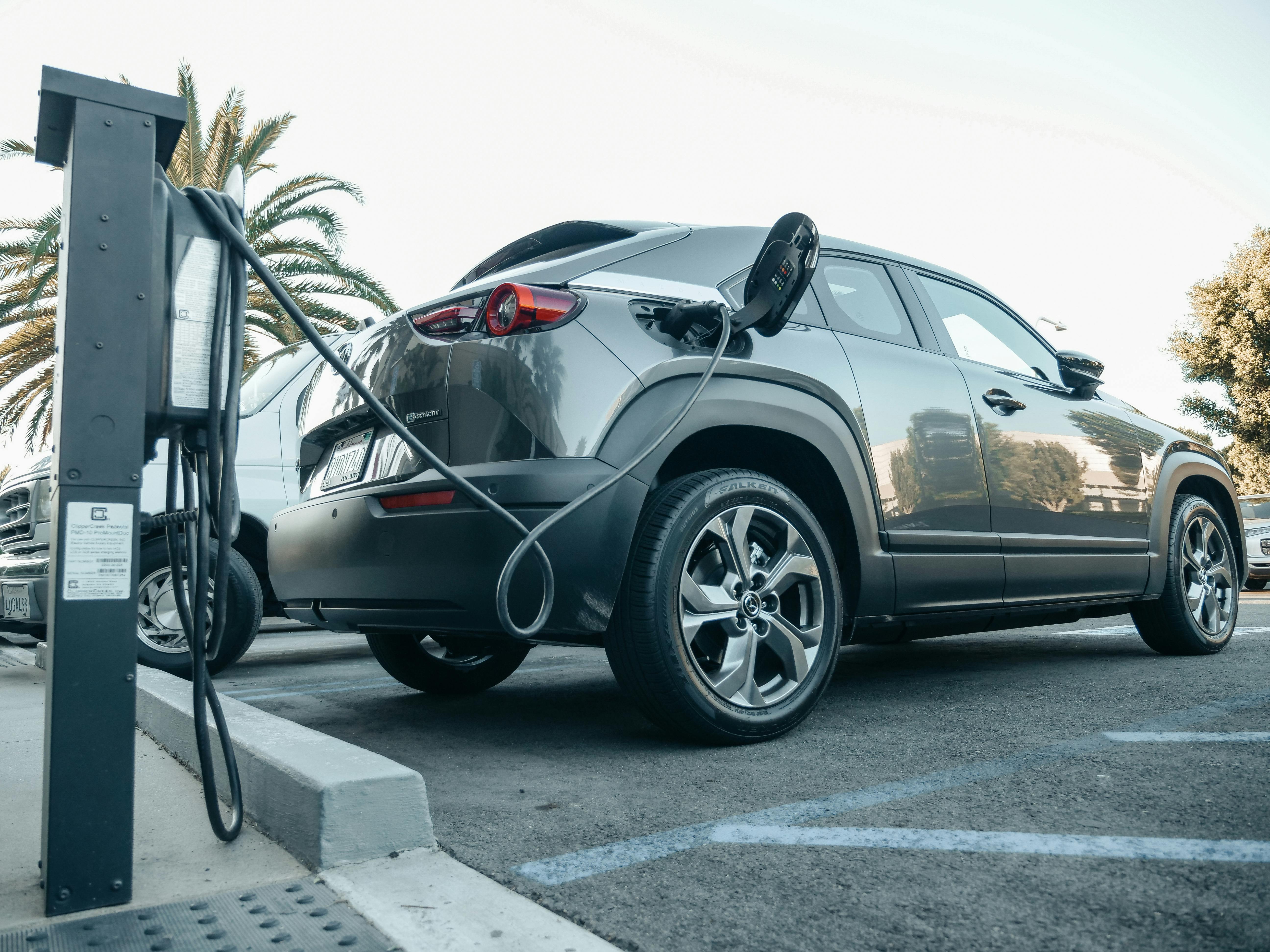 An electric vehicle in a charging station | Source: Pexels