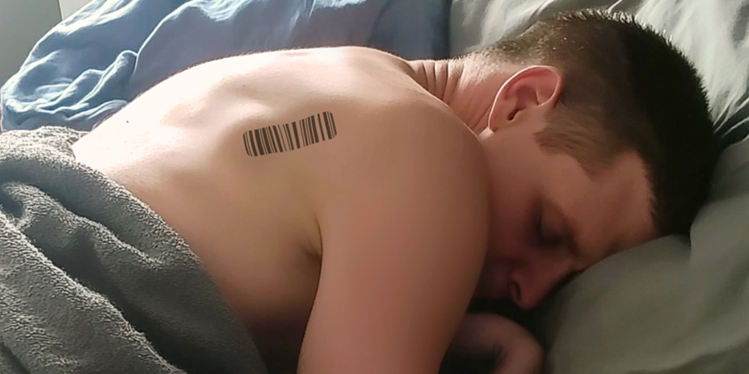 A man with a barcode on his back | Source: No source