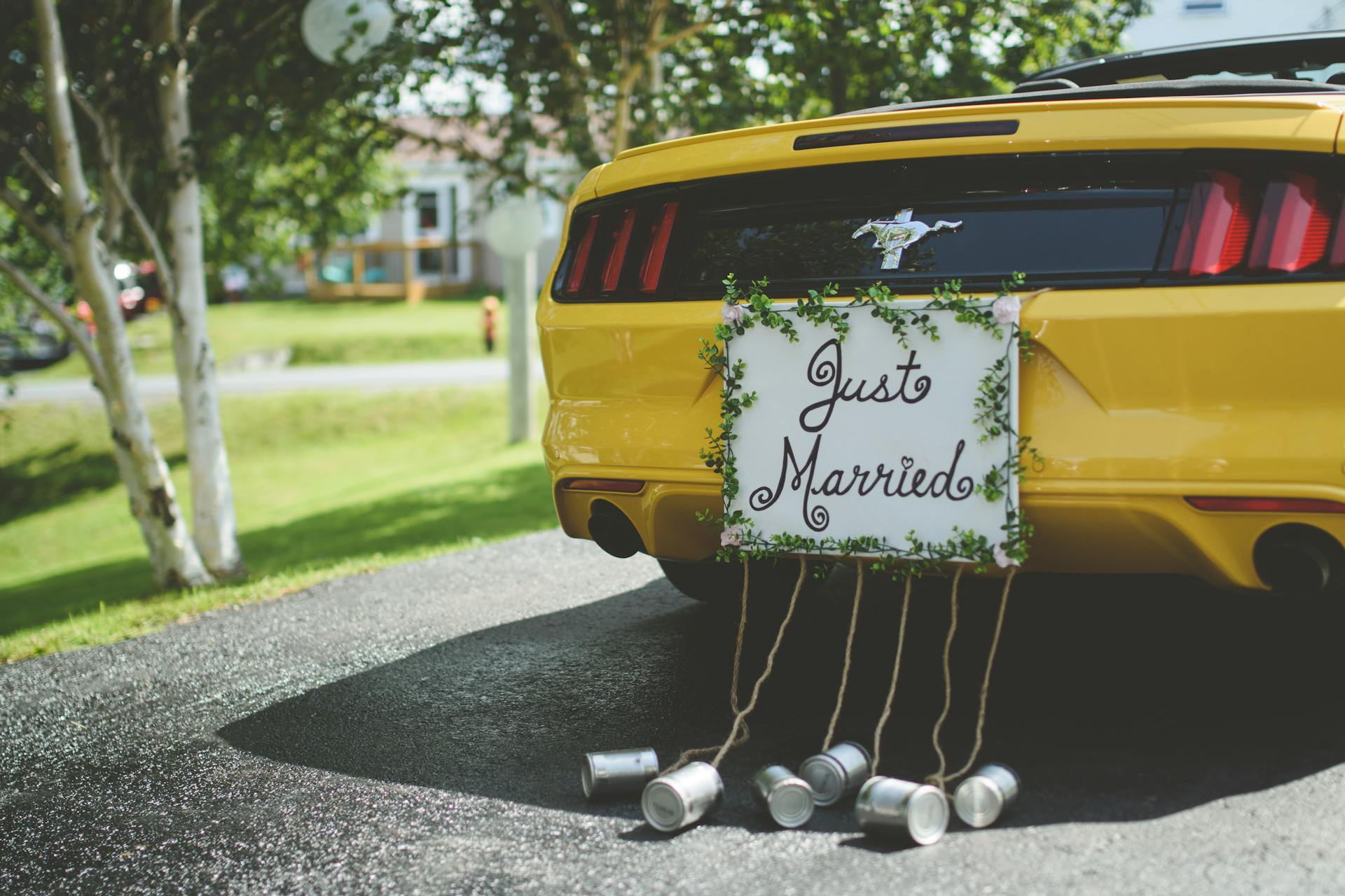 A car with a "just married" sign on the bumper | Source: Pexels