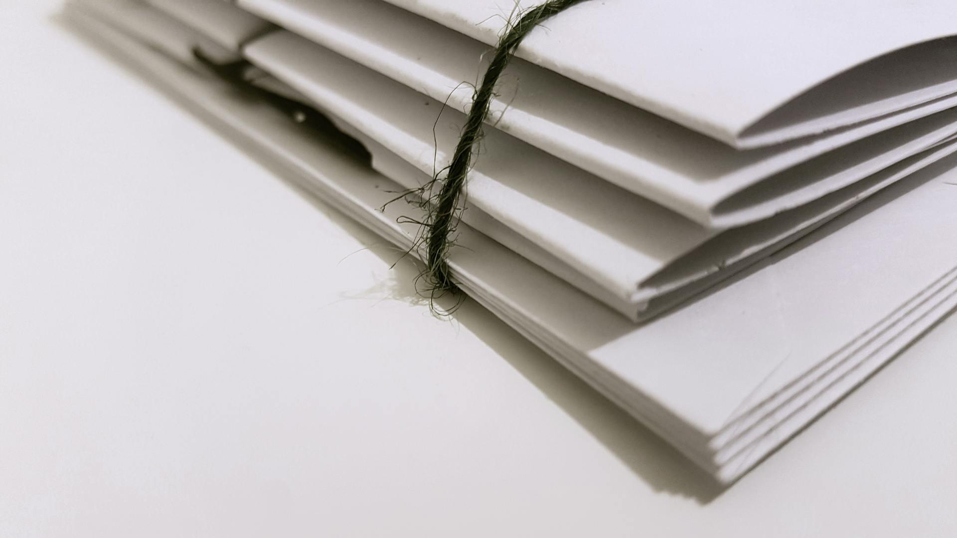 Folders on a table | Source: Pexels