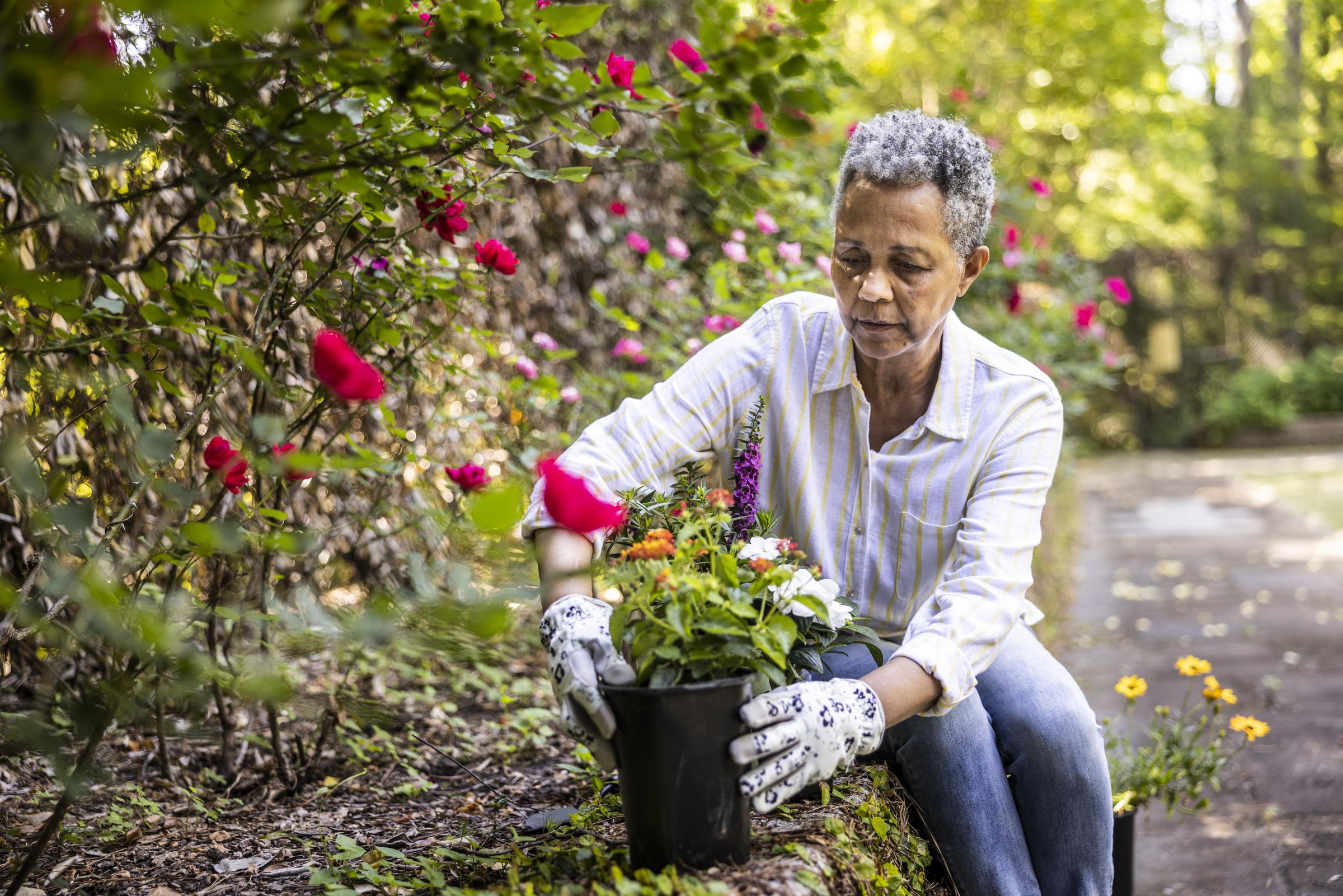 A woman tending to her garden | Source: Getty Images