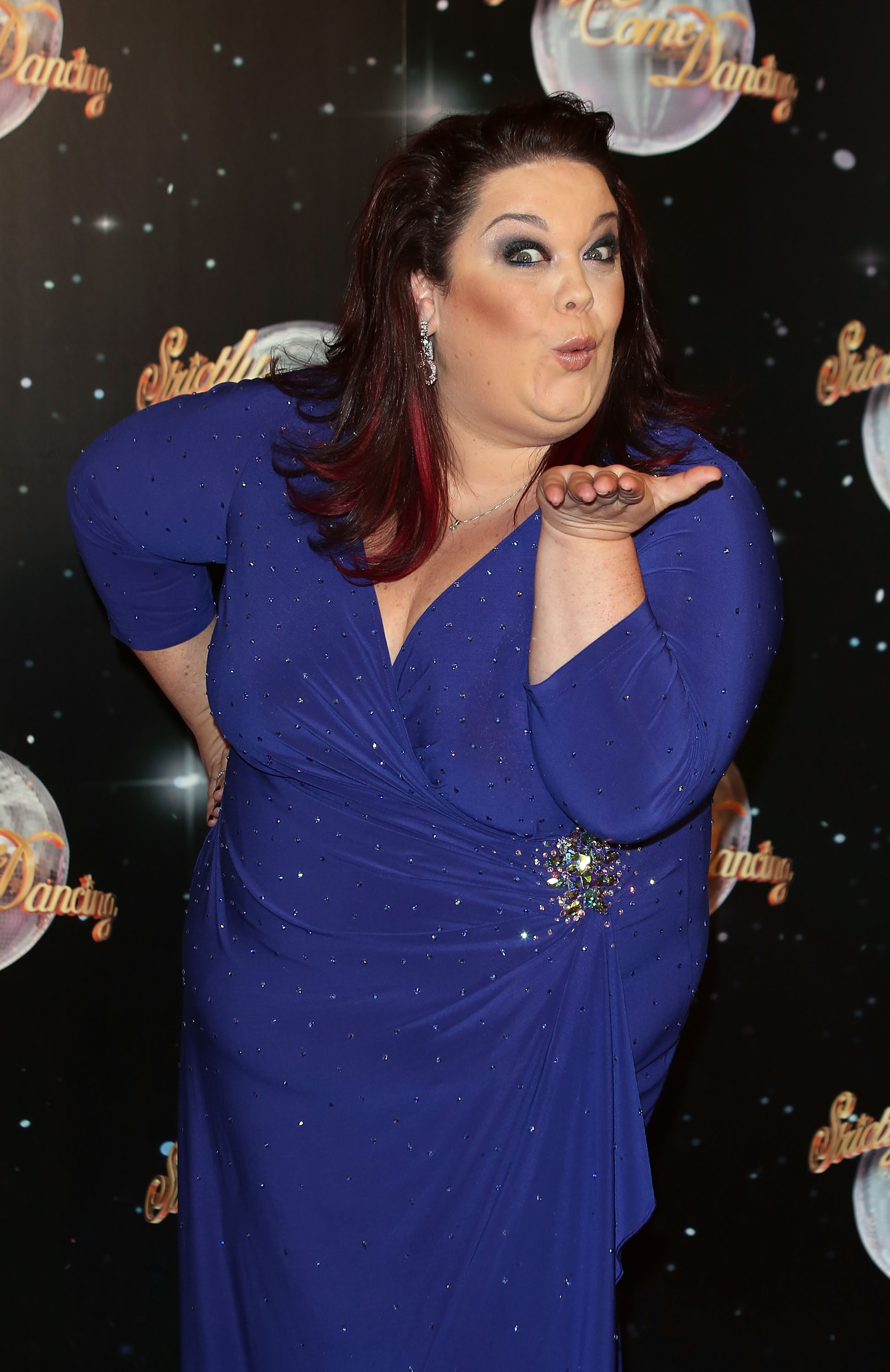 All eyes on Lisa! The Strictly star brings the glam in a sparkling royal-blue gown, blowing a playful kiss to photographers at the show’s 2012 launch on 11 September — and stealing the spotlight at BBC Television Centre.