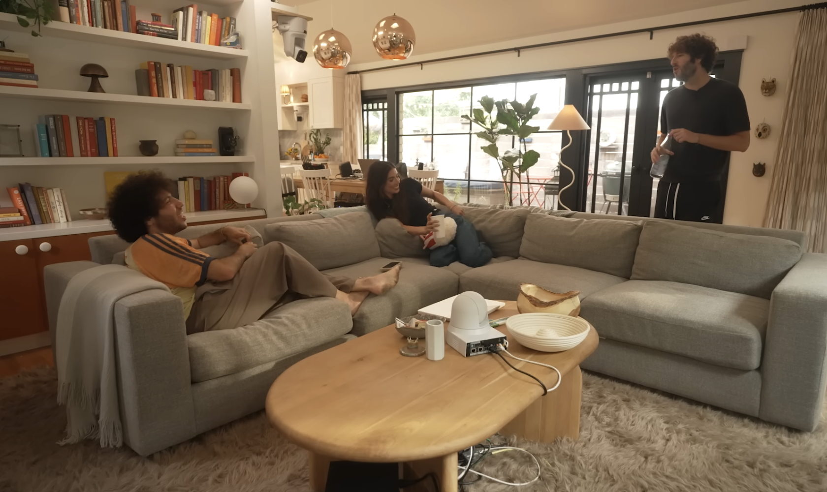 Benny Blanco, Kristin Batalucco, and Lil Dicky have a fun time on their podcast. | Source: YouTube/FriendsKeepSecrets