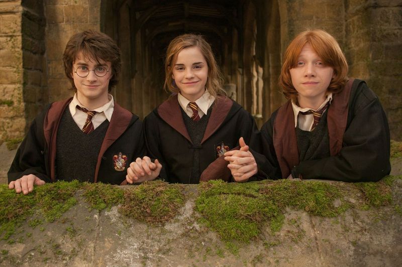 Daniel Radcliffe, Emma Watson, and Rupert Grint on the set of "Harry Potter and the Goblet of Fire" on March 18, 2005. | Source: Getty Images