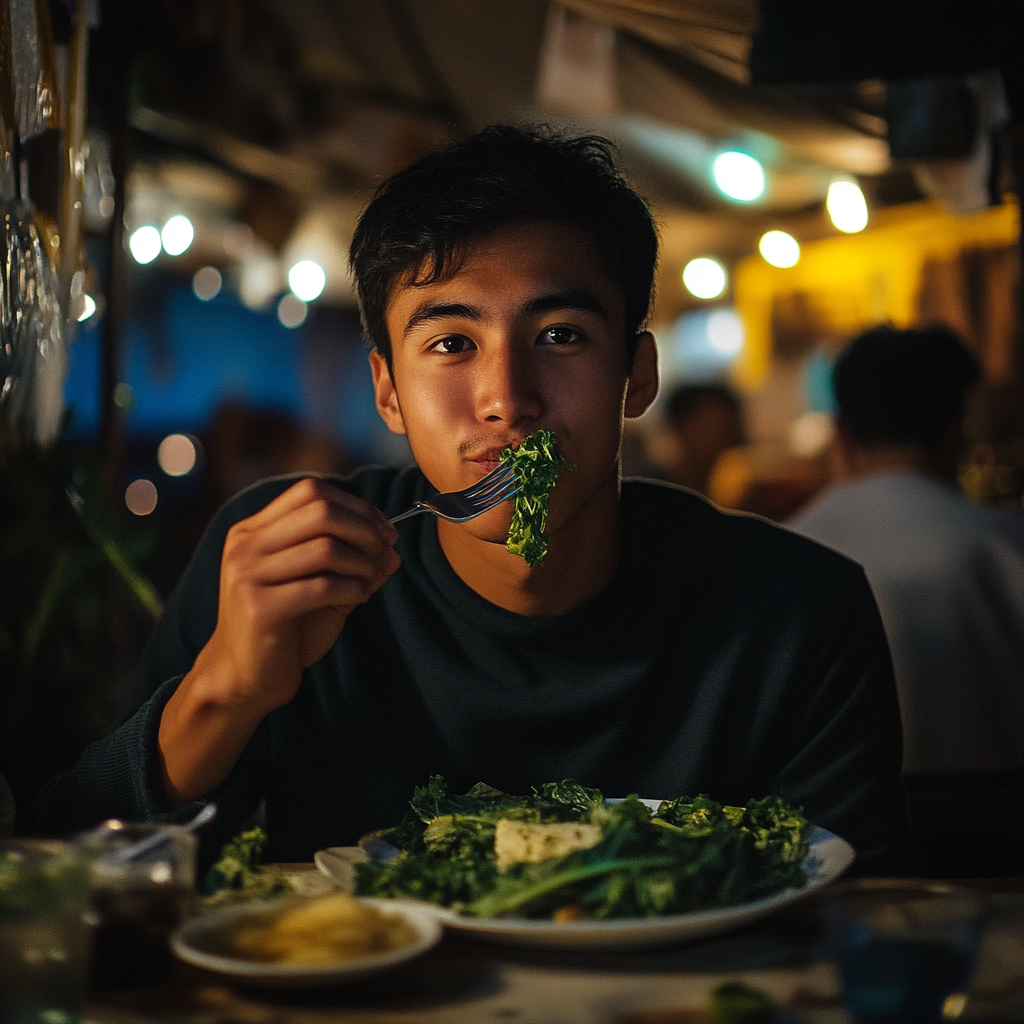 A man eating kales | Source: No source