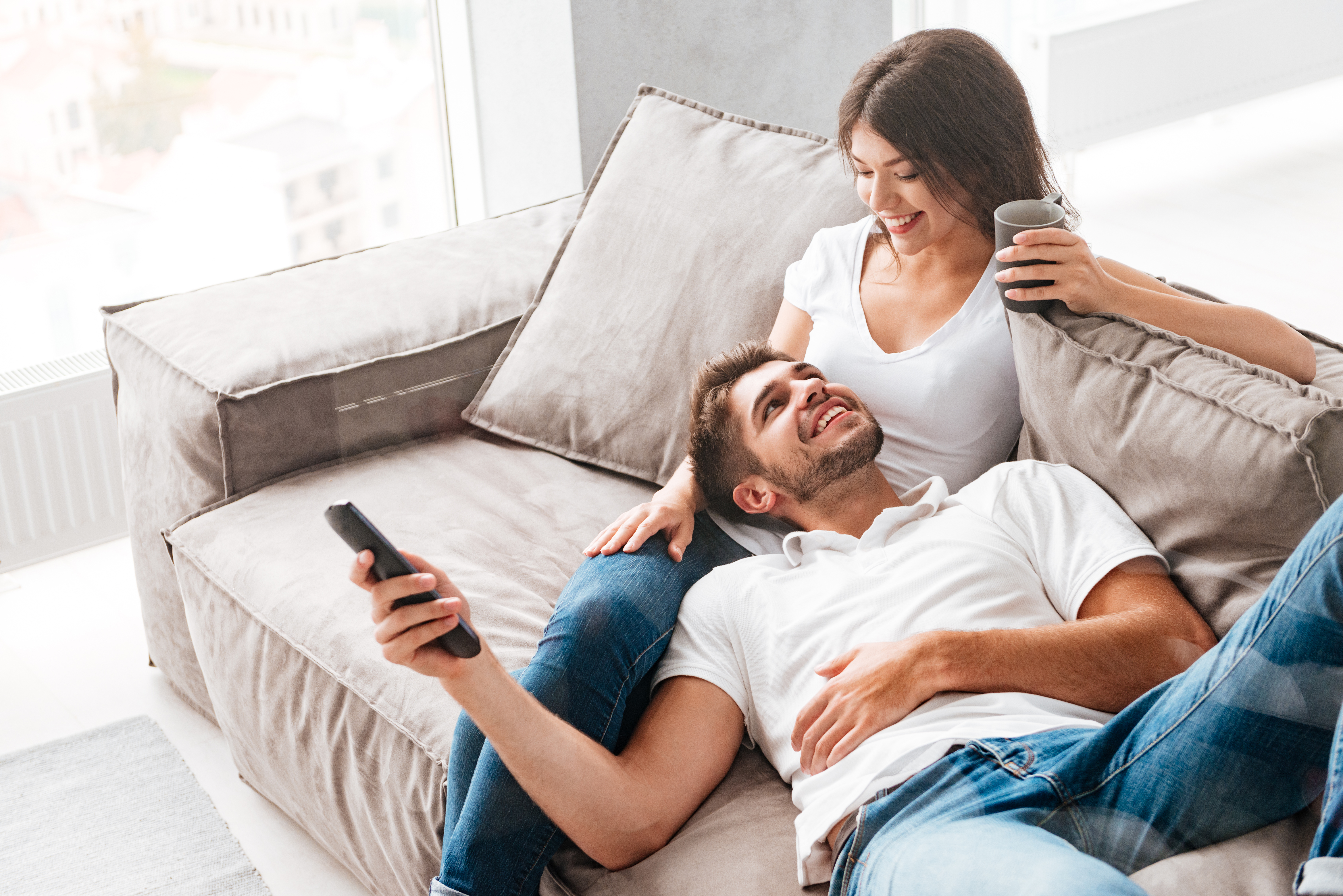 Young couple in the room | Source: Shutterstock