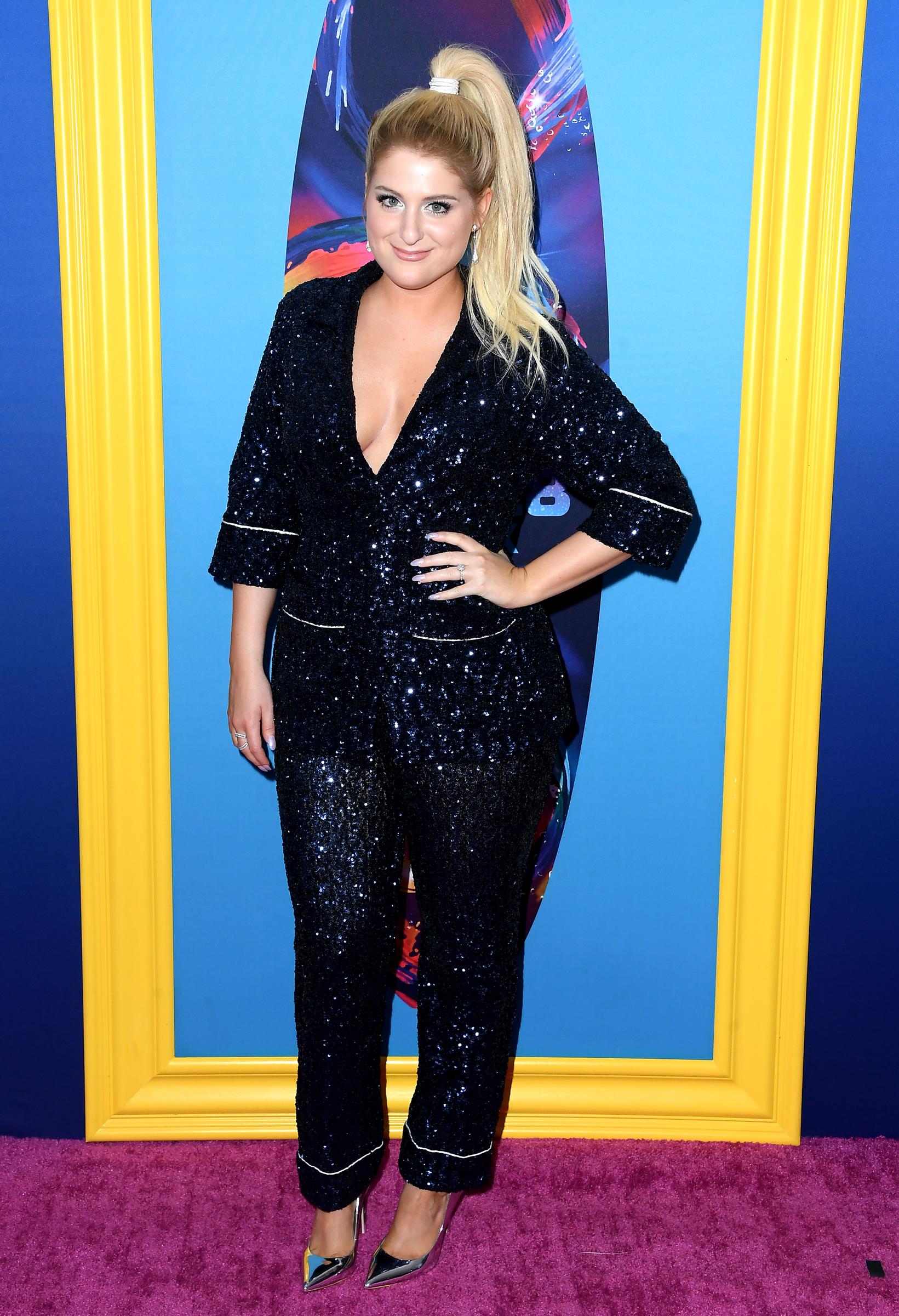 Meghan Trainor, 24, showed a smooth, slightly fuller lower face and defined cheekbones that tapered toward a softly pointed chin, giving her face an oval contour, while attending FOX's Teen Choice Awards on August 12, 2018, at The Forum in Inglewood, California.