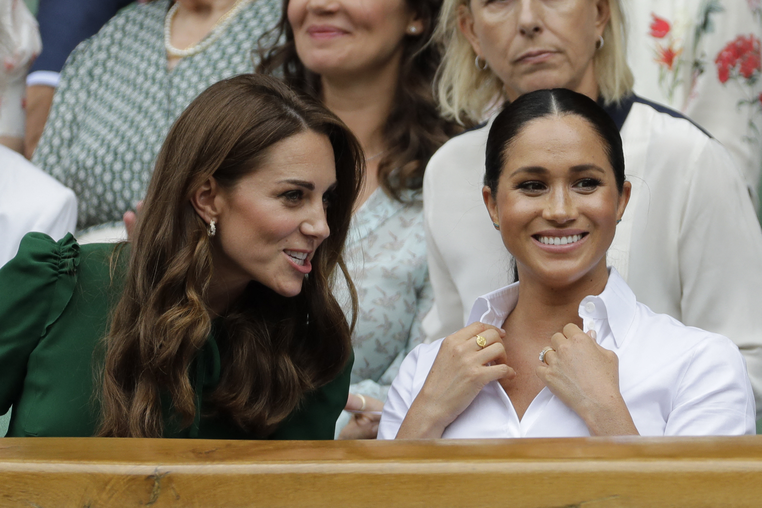 Catherine, Duchess of Cambridge and Britain's Meghan, Duchess of Sussex, watch Romania's Simona Halep playing against Serena Williams during their women's singles final of the 2019 Wimbledon Championships on July 13, 2019 | Source: Getty Images