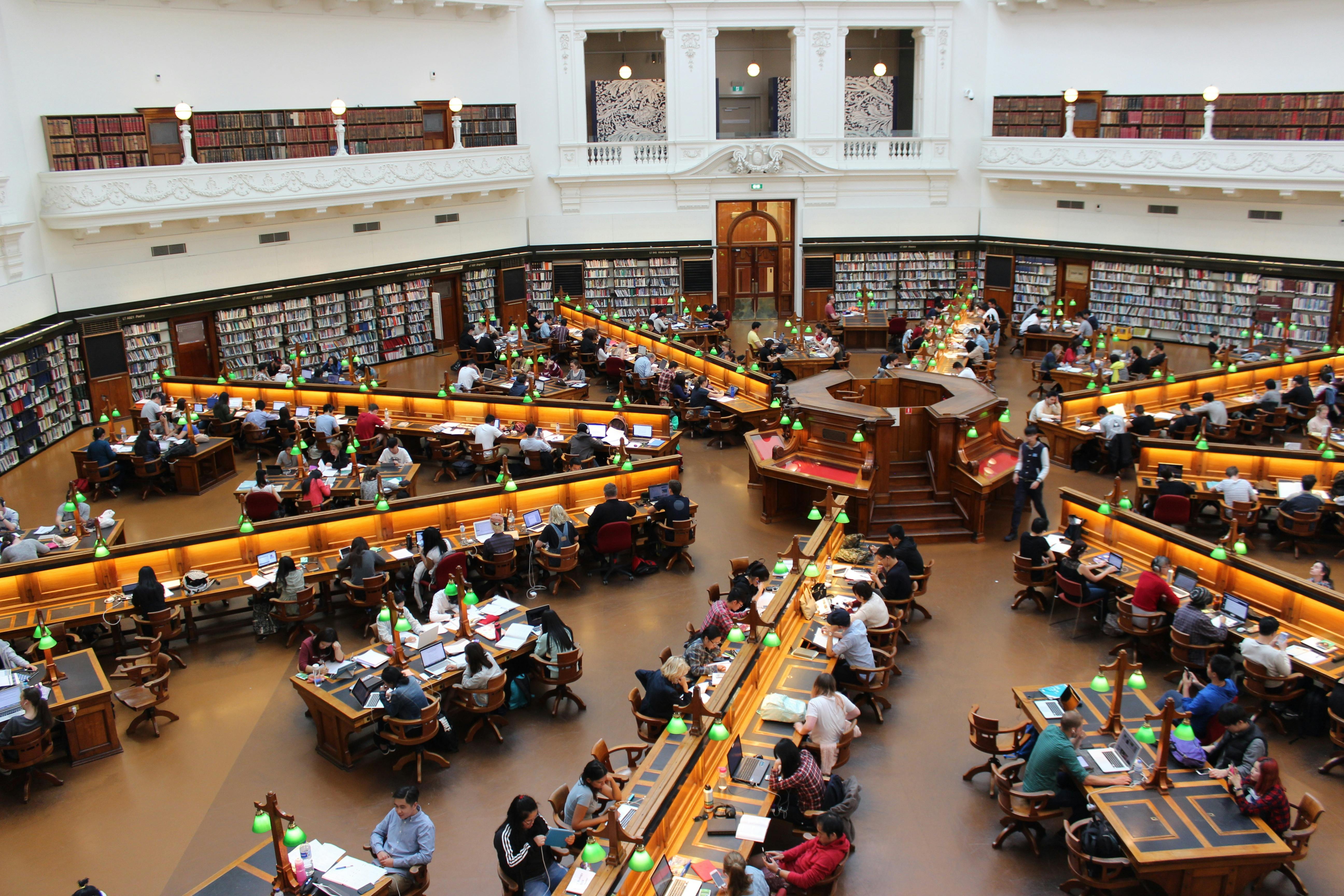 Students in a library | Source: Pexels