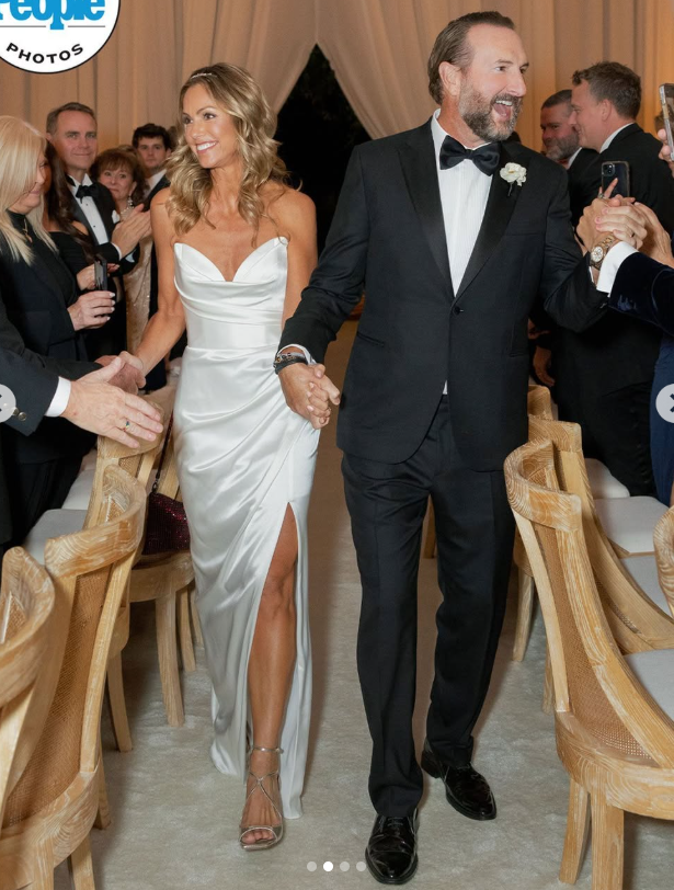 Christine Baumgartner and Josh Connor are pictured during their wedding ceremony, dated October 20, 2025 | Source: Instagram/people