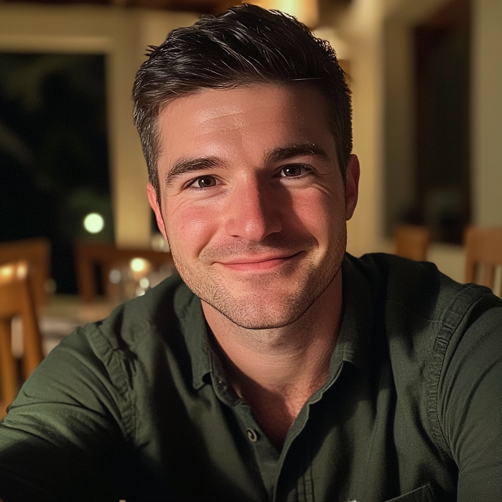 A man sitting at a dining table | Source: No source