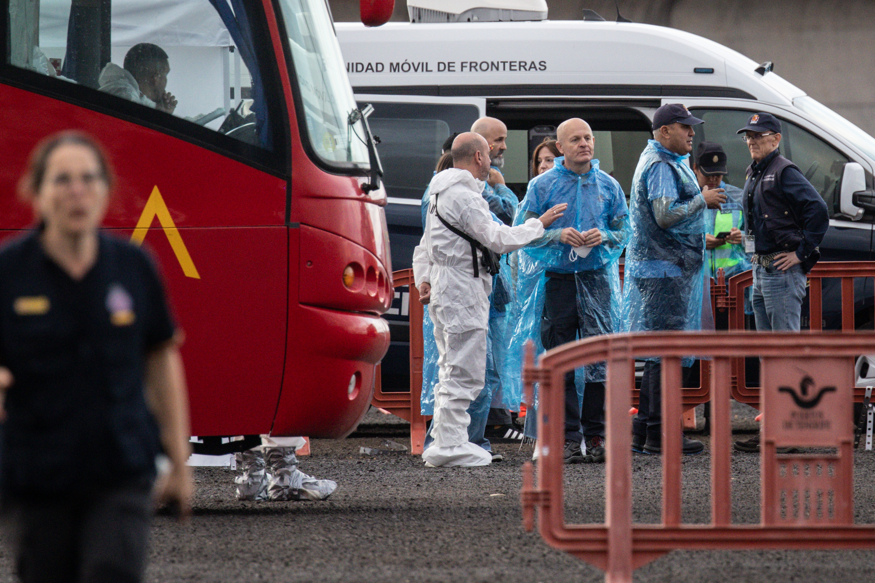 Medical teams and officials prepare for passengers to arrive after the MV Hondius docked in the Granadilla Port on May 10, 2026 in Tenerife, part of the Canary Islands, Spain. | Source: Getty Images