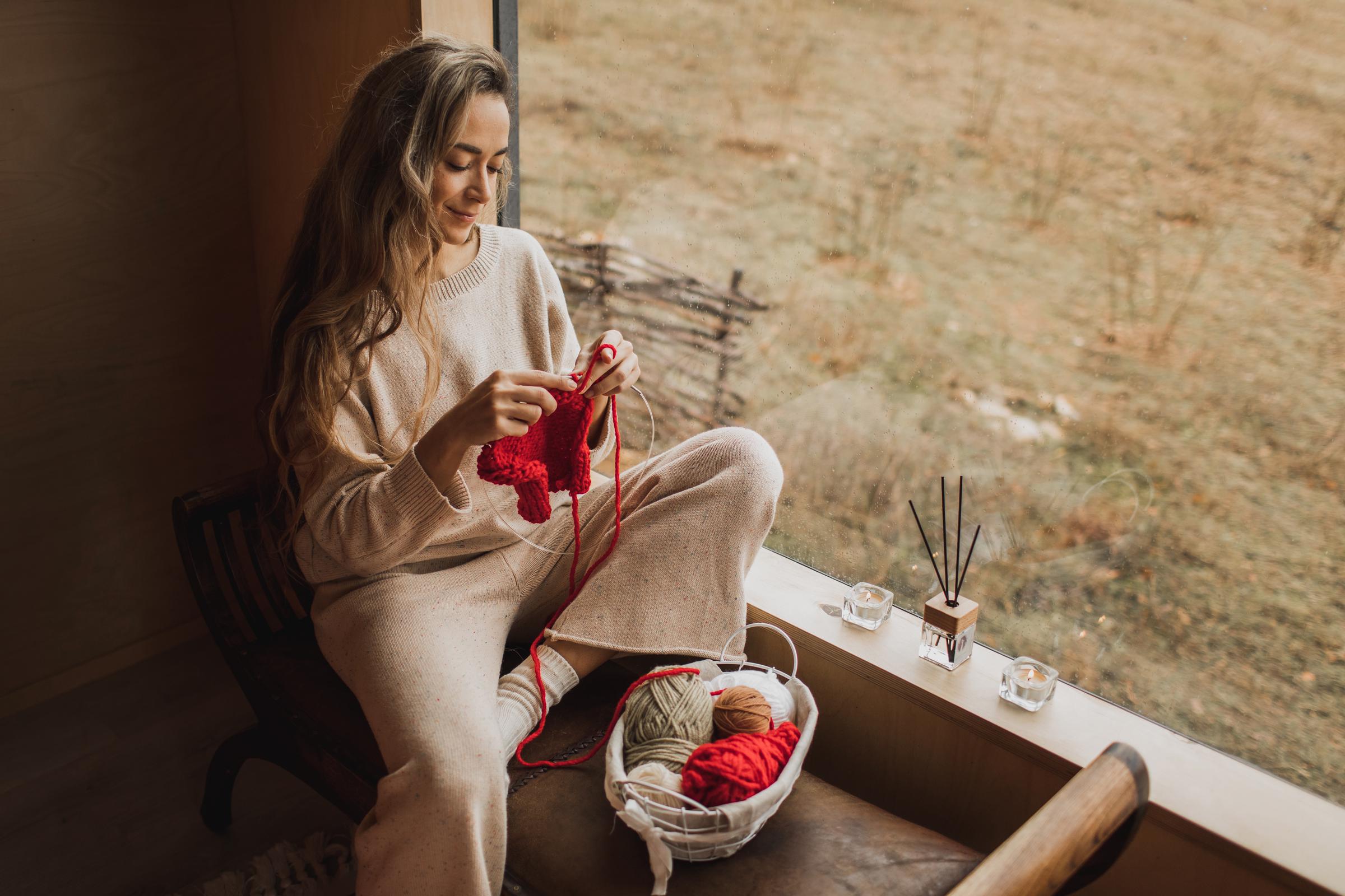 A woman knitting | Source: Getty Images