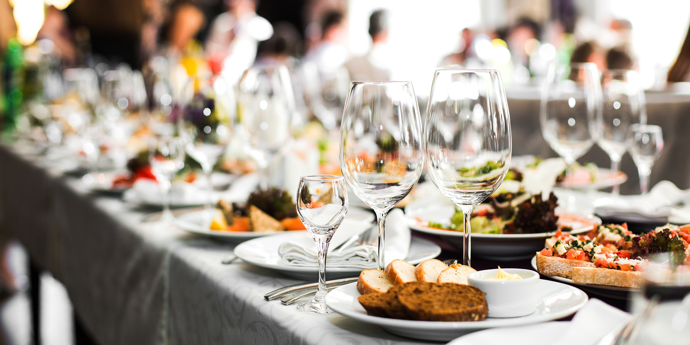 A formal dinner set out for an event | Source: Shutterstock