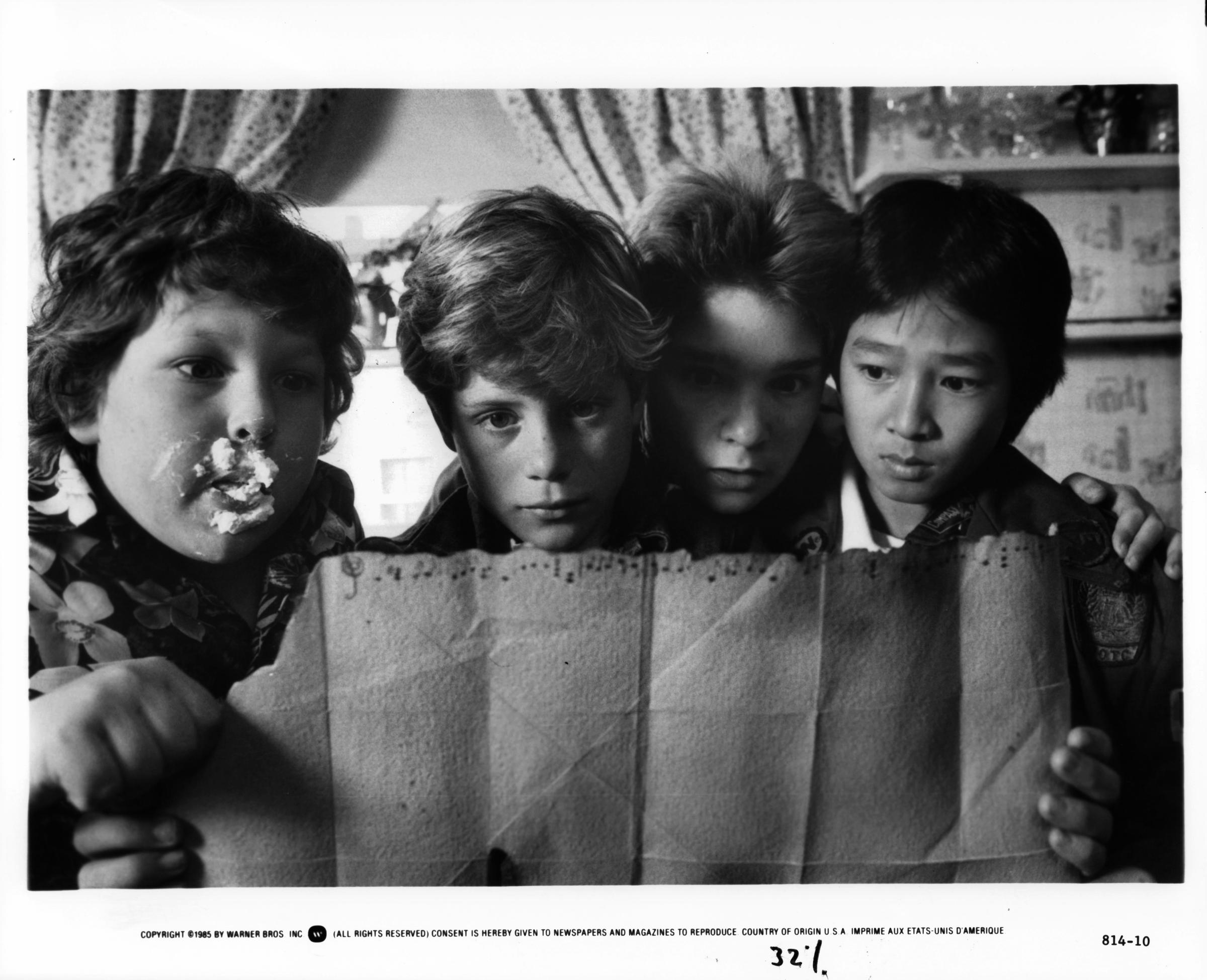 Jeff Cohen, Sean Astin, Corey Feldman, and Jonathan Ke Quan in a scene from the film "Goonies," in 1985 | Source: Getty Images