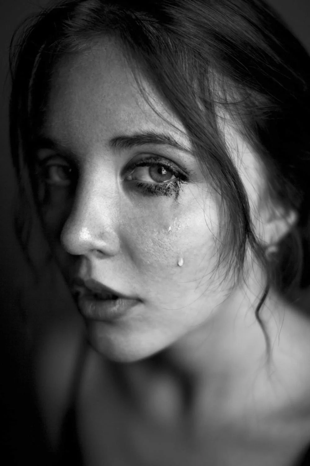 A crying woman looking at the camera | Source: Pexels