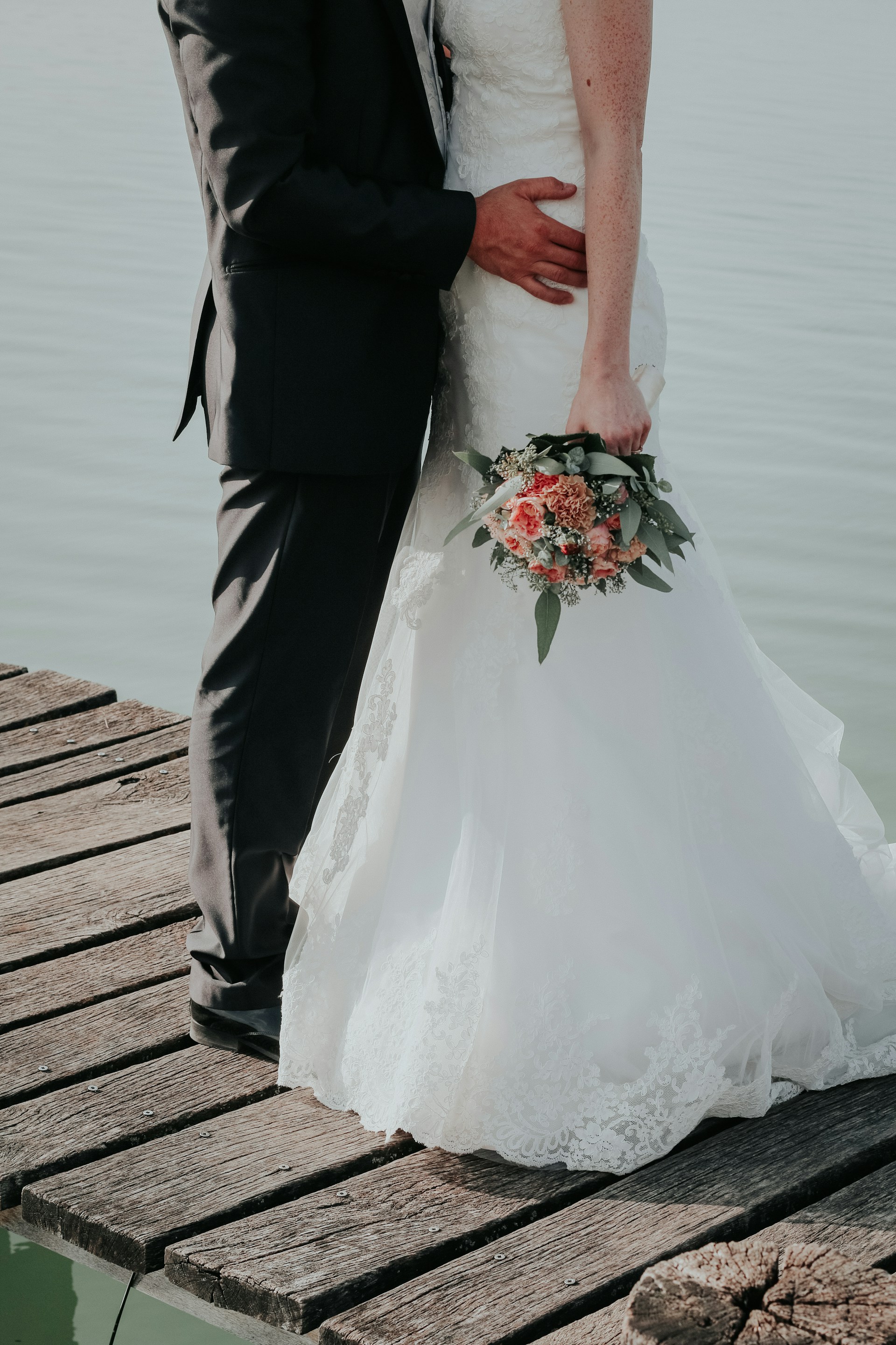 Cropped shot of a newlywed couple | Source: Unsplash