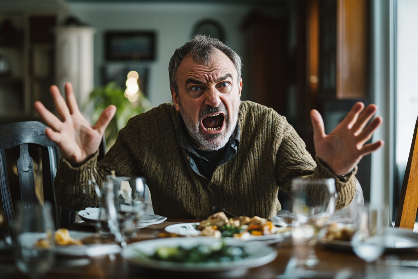 A man gesturing angrily during dinner | Source: No source