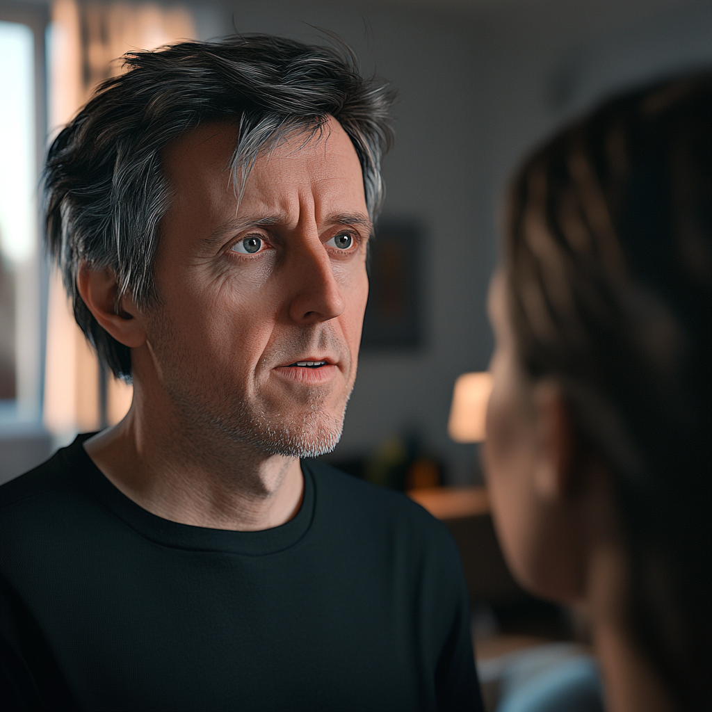 A man talking to his stepdaughter | Source: no source