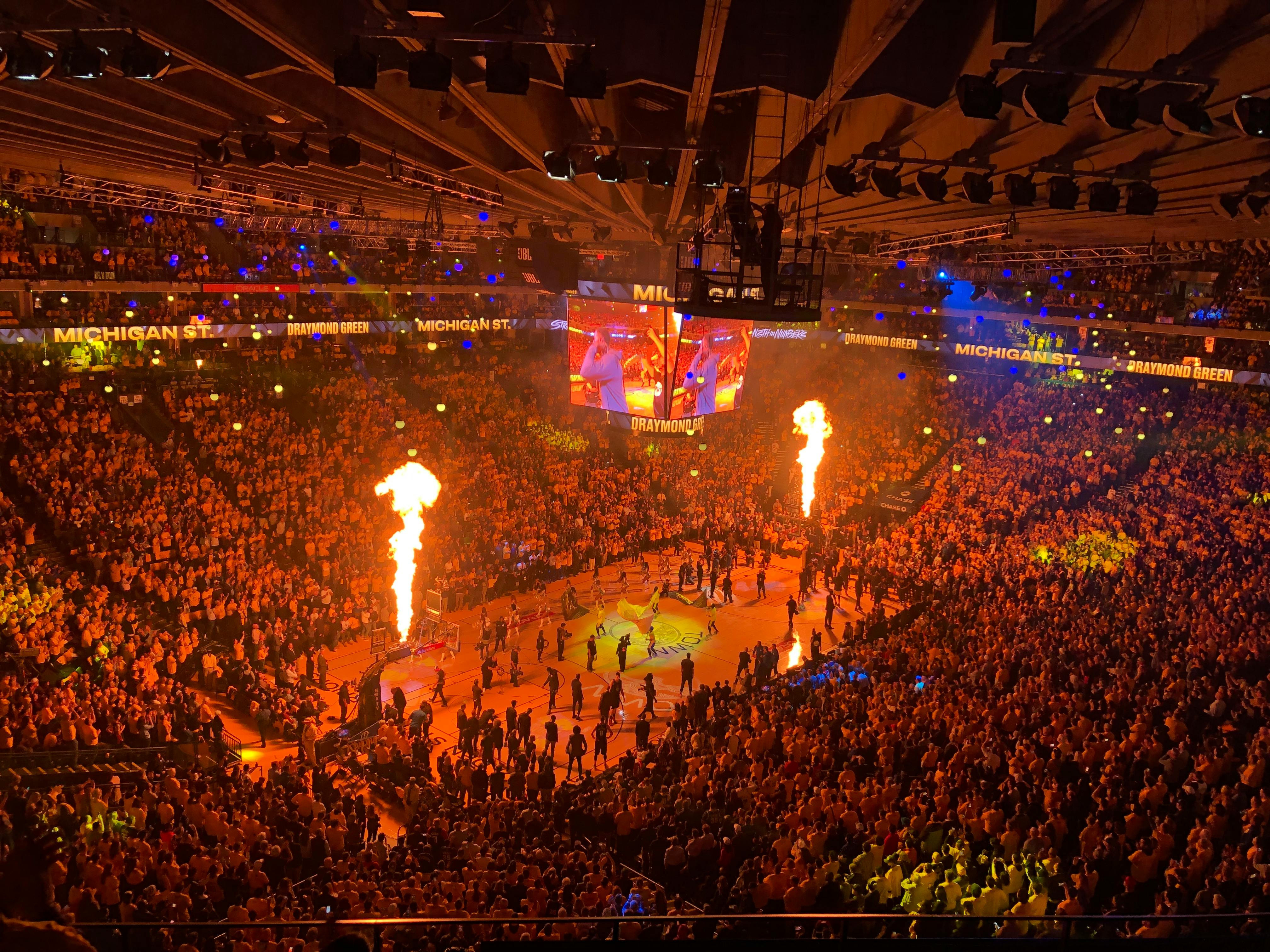 People in a basketball stadium | Source: Pexels