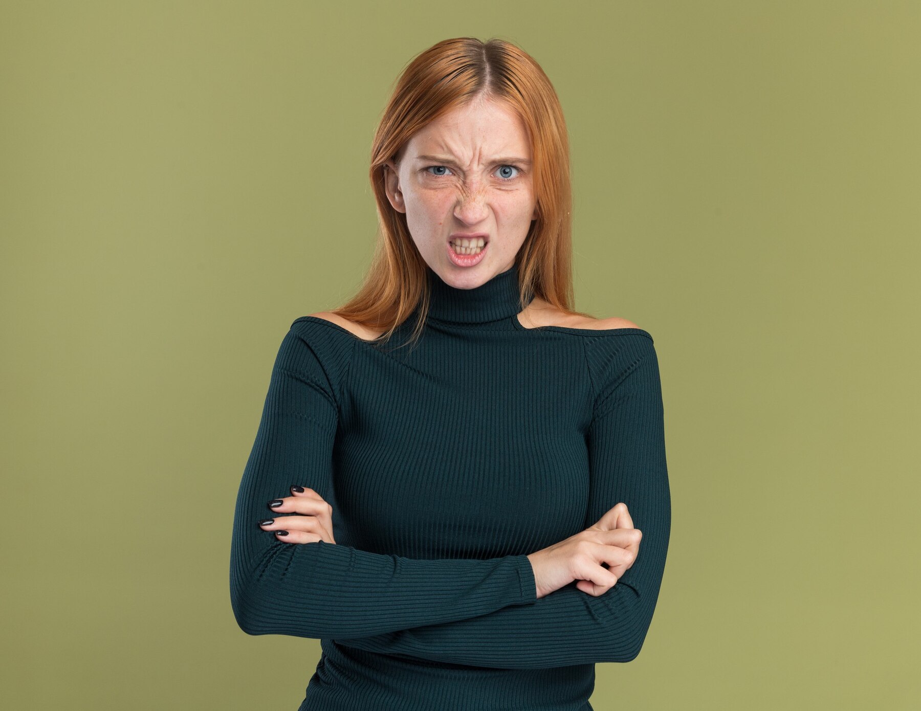 An annoyed young woman | Source: Freepik