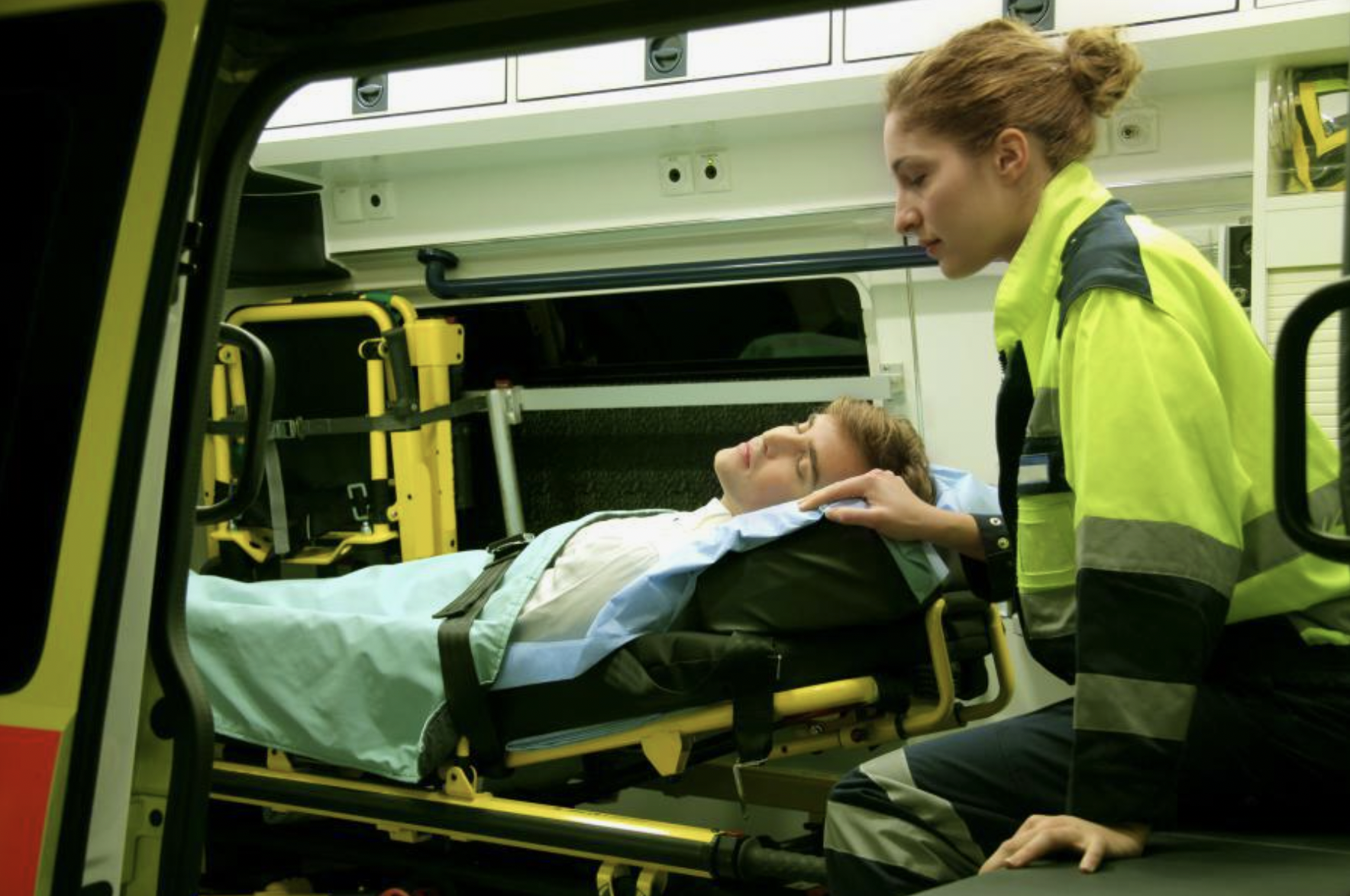 Unconscious man in ambulance car | Source: Shutterstock