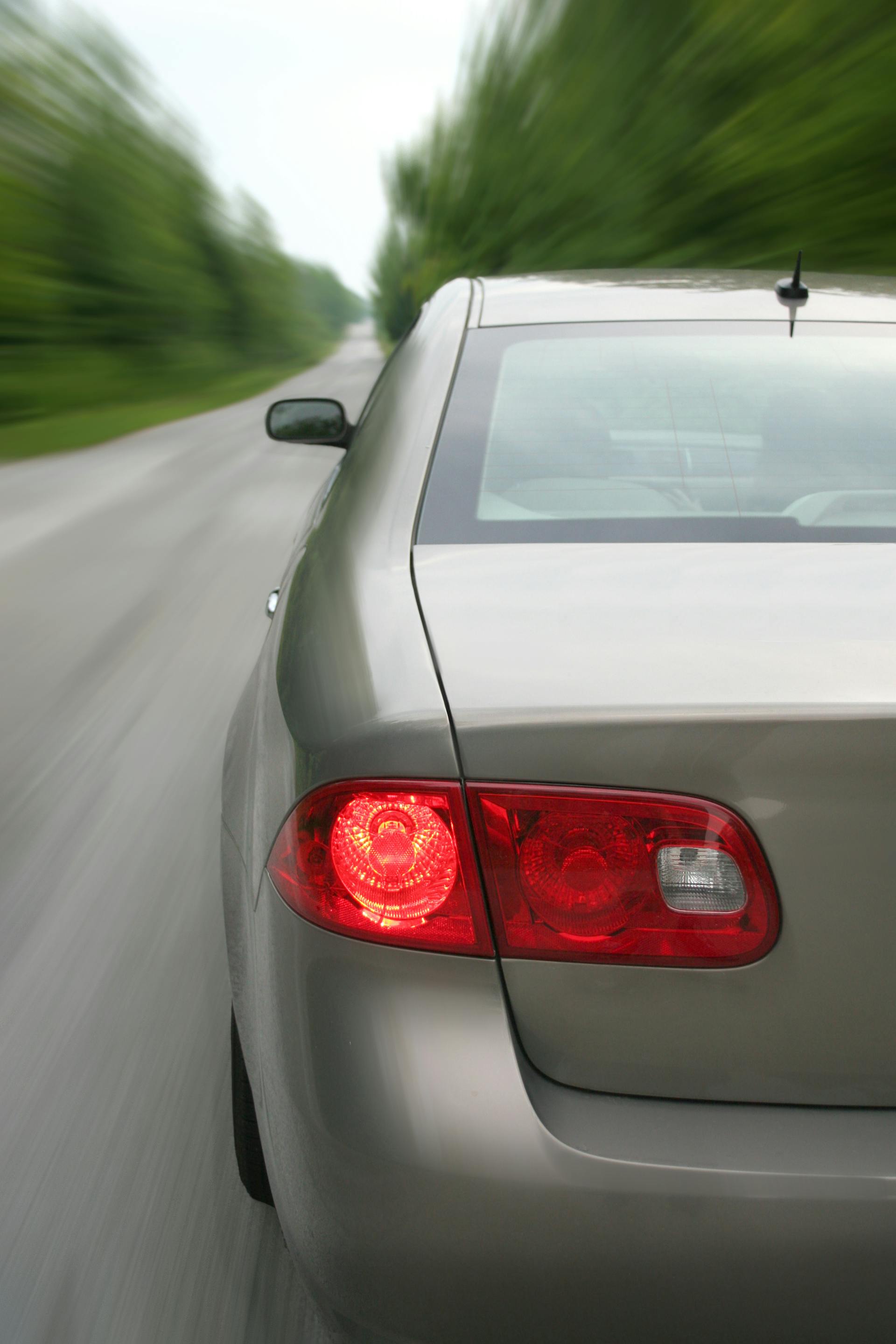 A car driving on a road | Source: Pexels